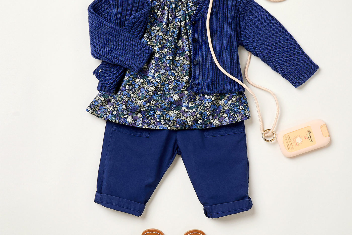 Summer 2025 Baby girl's look - Ruffled-sleeve blouse and blue trousers