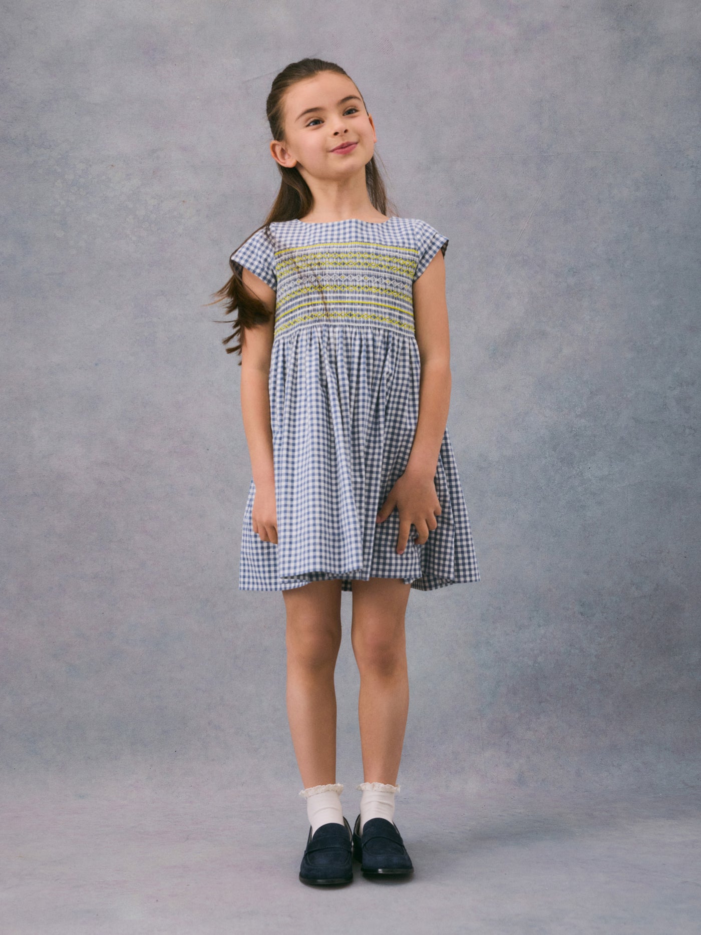 Winter 2024 girl's look smocked dress