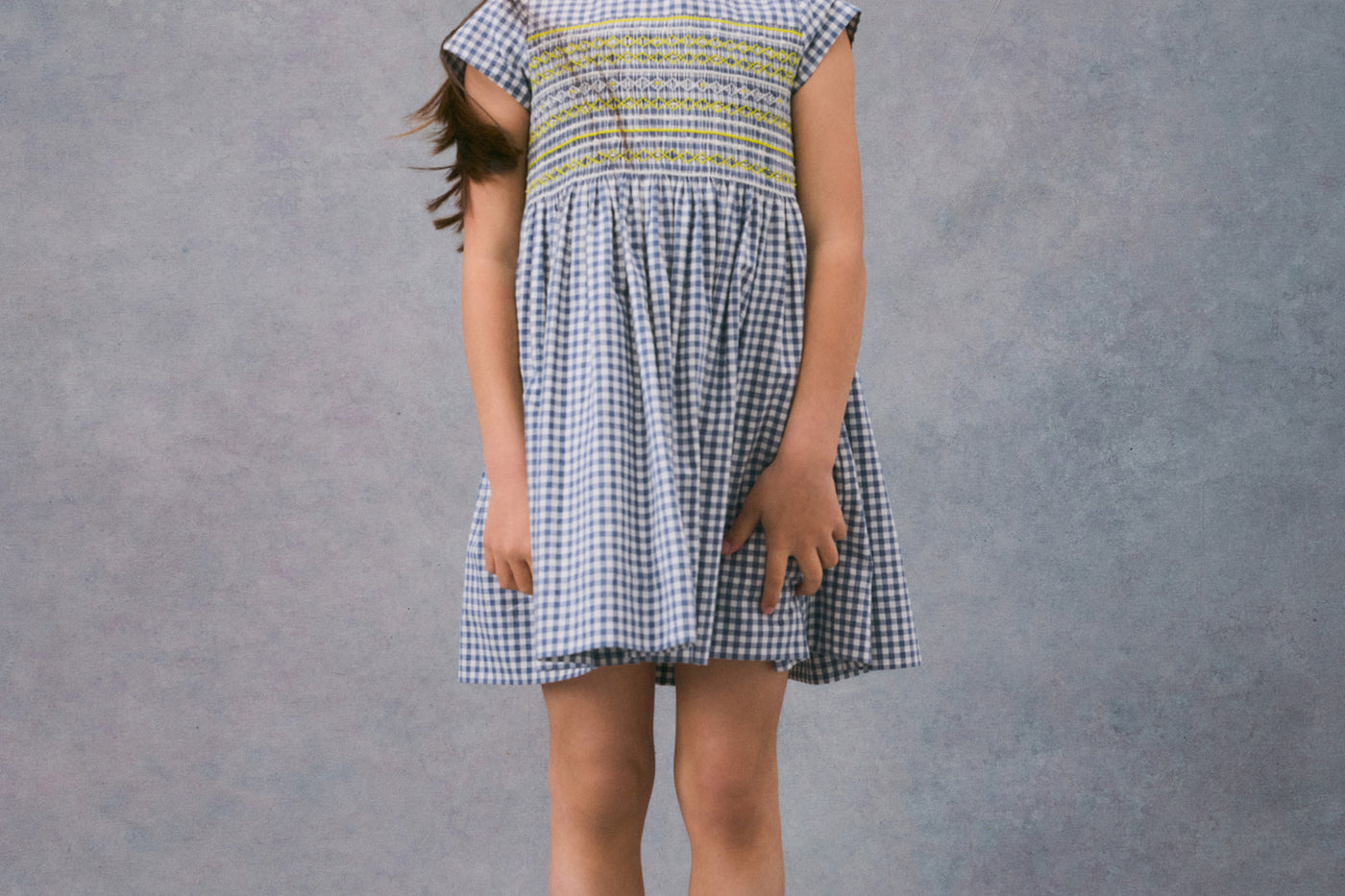 Winter 2024 girl's look smocked dress