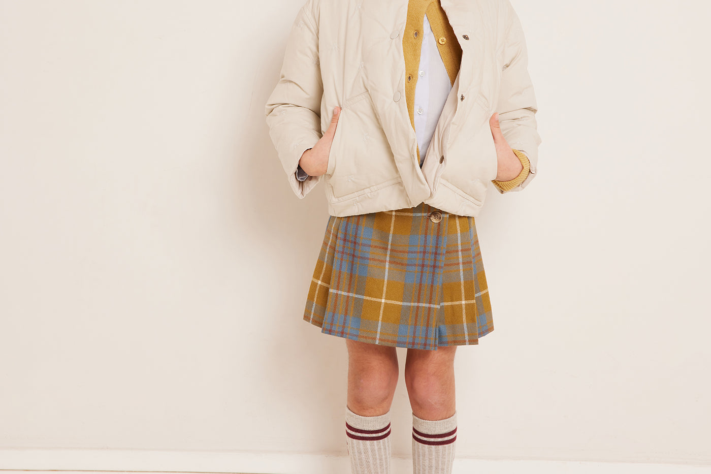 Winter 2023 girl's look tartan skirt