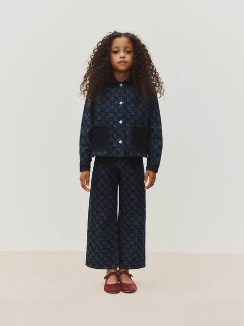 Minalie cherry checkerboard-print denim trousers in organic cotton