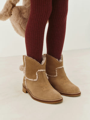 Maysha western boots in leather and faux fur