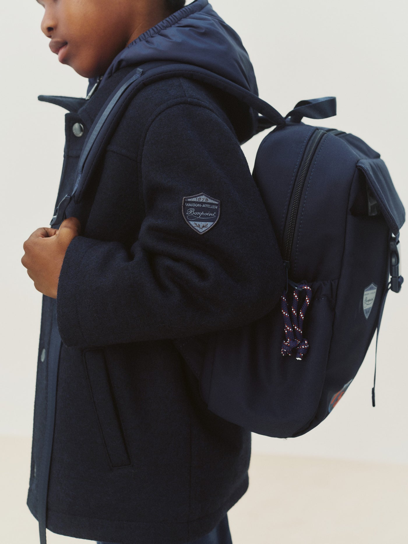 Marx quilted backpack with badges