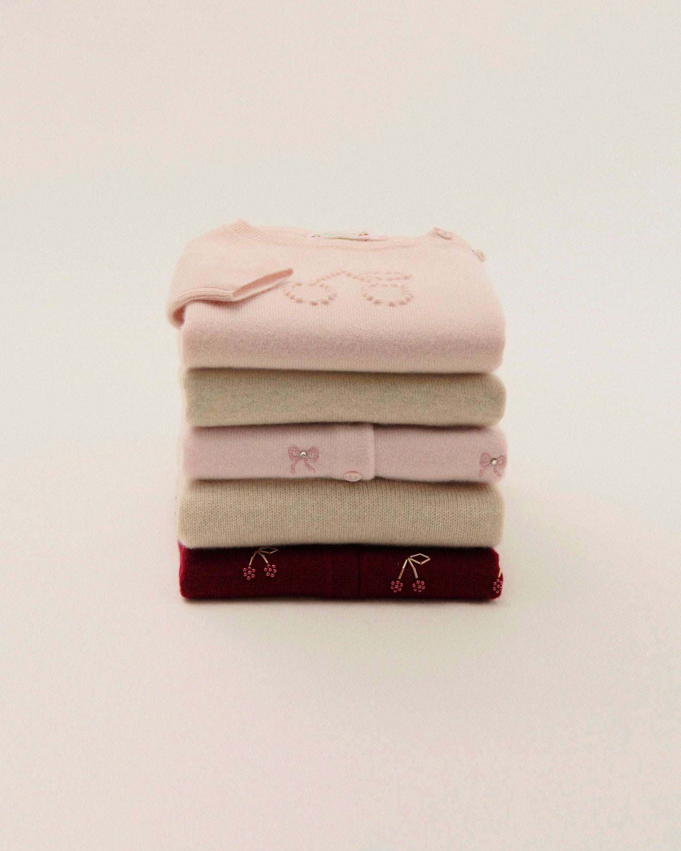 Cardigans and Sweaters<br>from £160