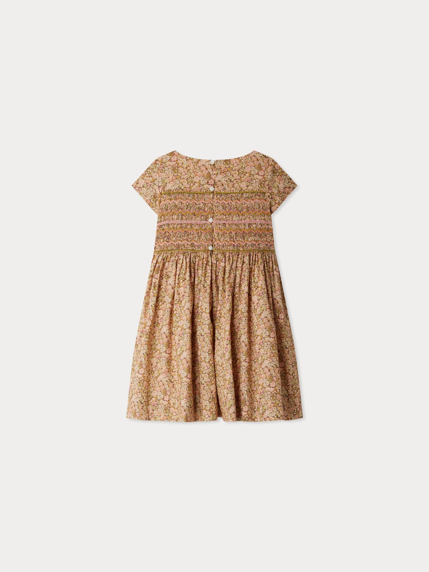 Smocked and embroidered Duchess dress in Liberty fabric in organic cotton