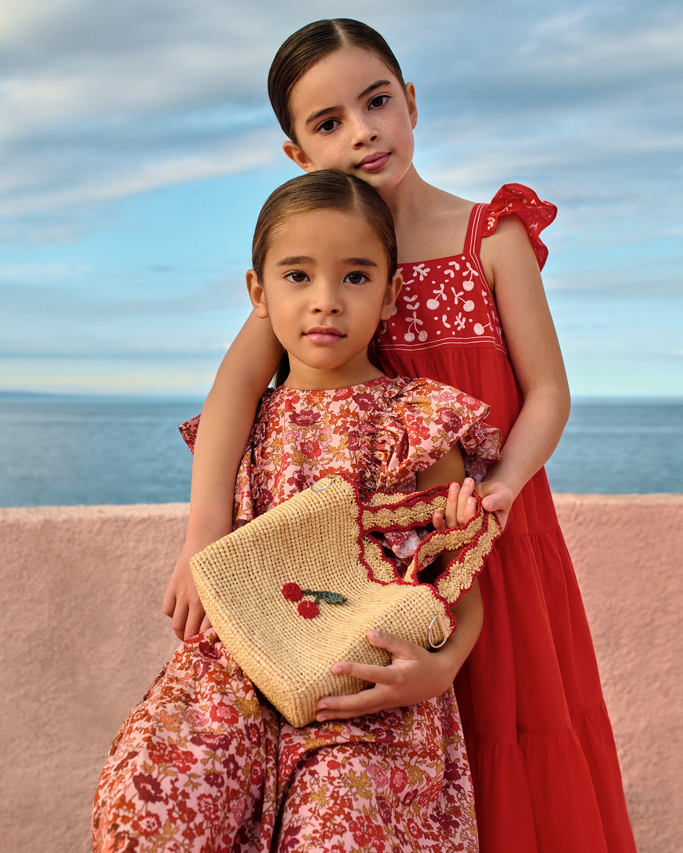 Cora hand-embroidered dress with ruffles in organic cotton