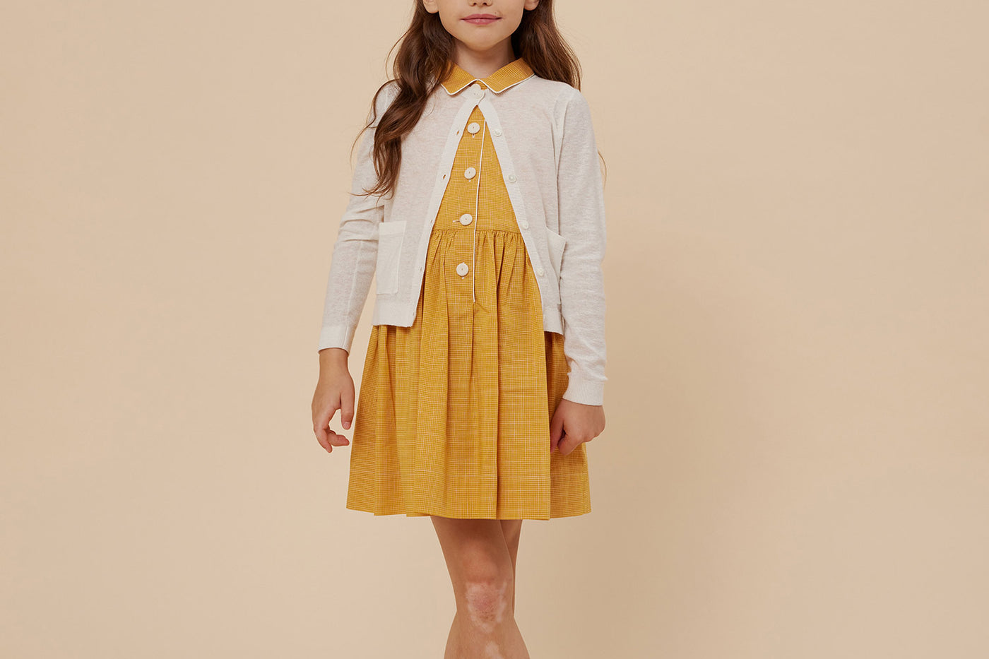 Summer 2024 girl's look buttoned dress