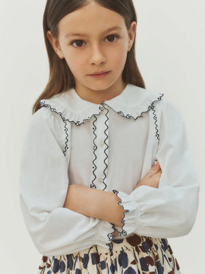 Maneke blouse with Peter Pan collar embroidery in organic cotton