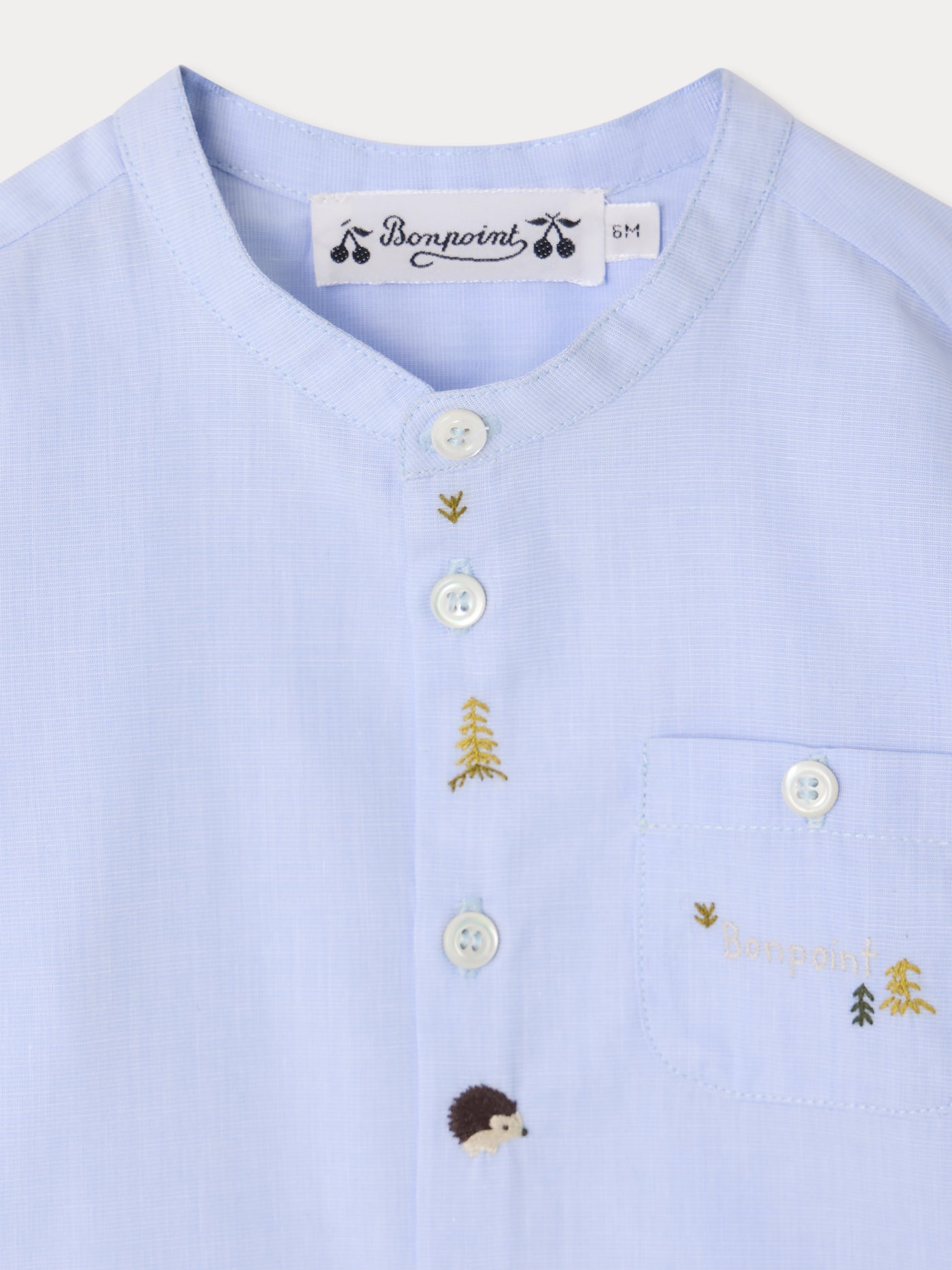 Matis baby shirt with hand-embroidered fir trees and hedgehogs