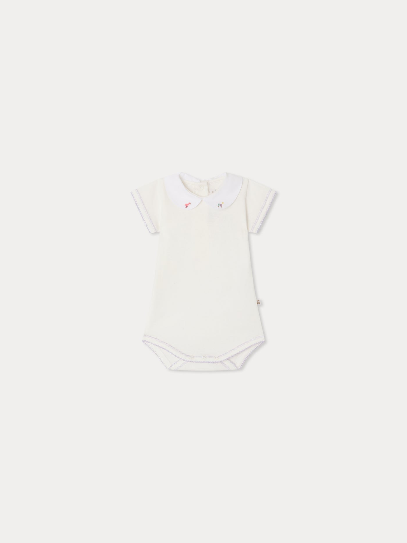 Hand-embroidered Cygne bodysuit in organic cotton
