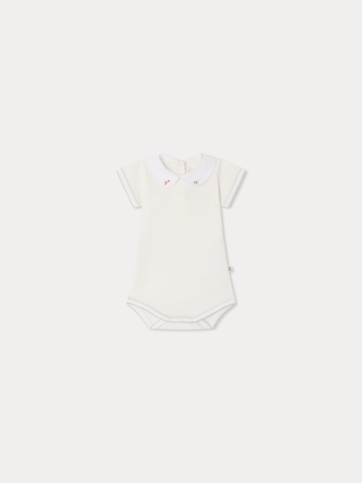 Hand-embroidered Cygne bodysuit in organic cotton