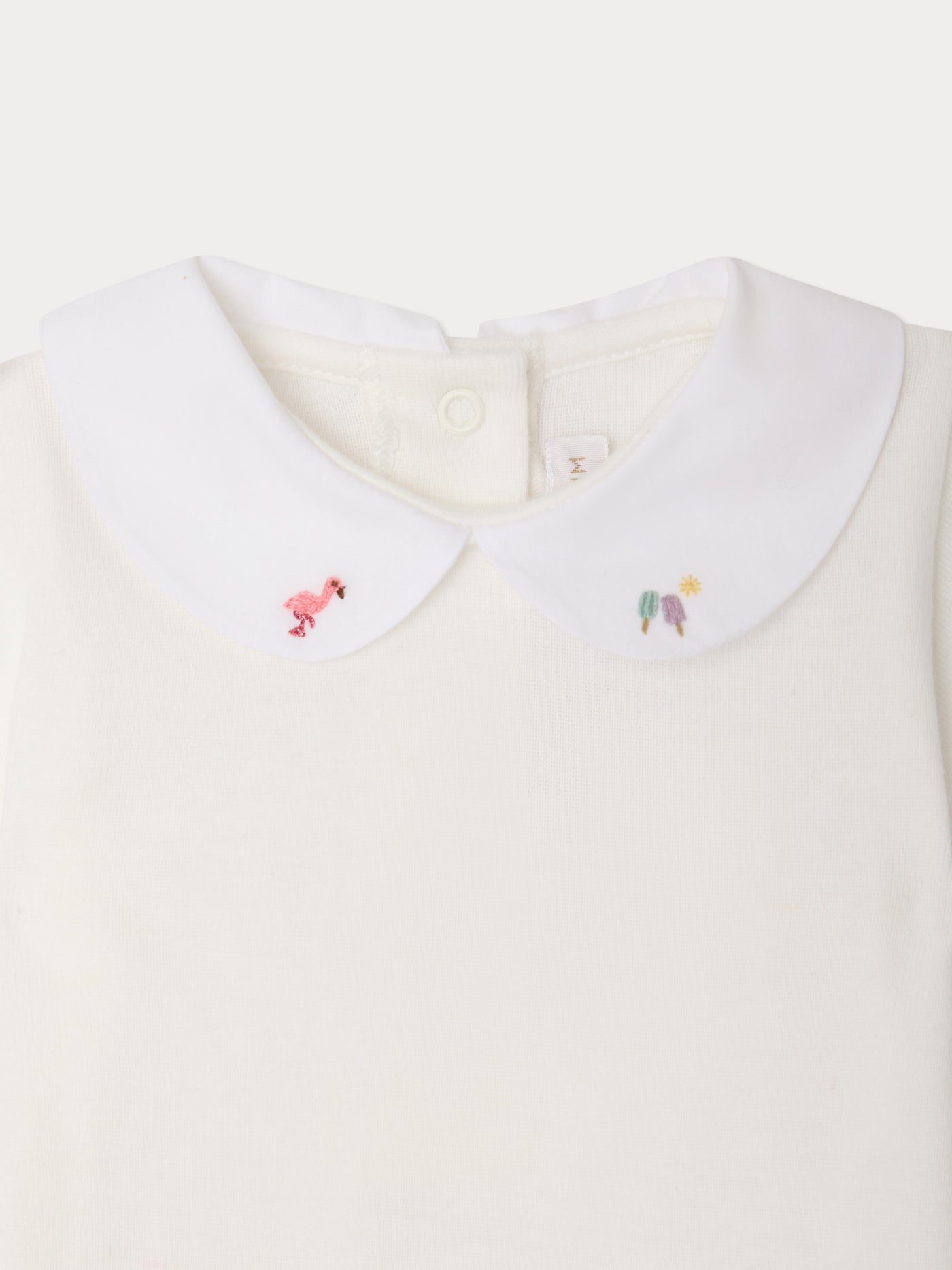 Hand-embroidered Cygne bodysuit in organic cotton
