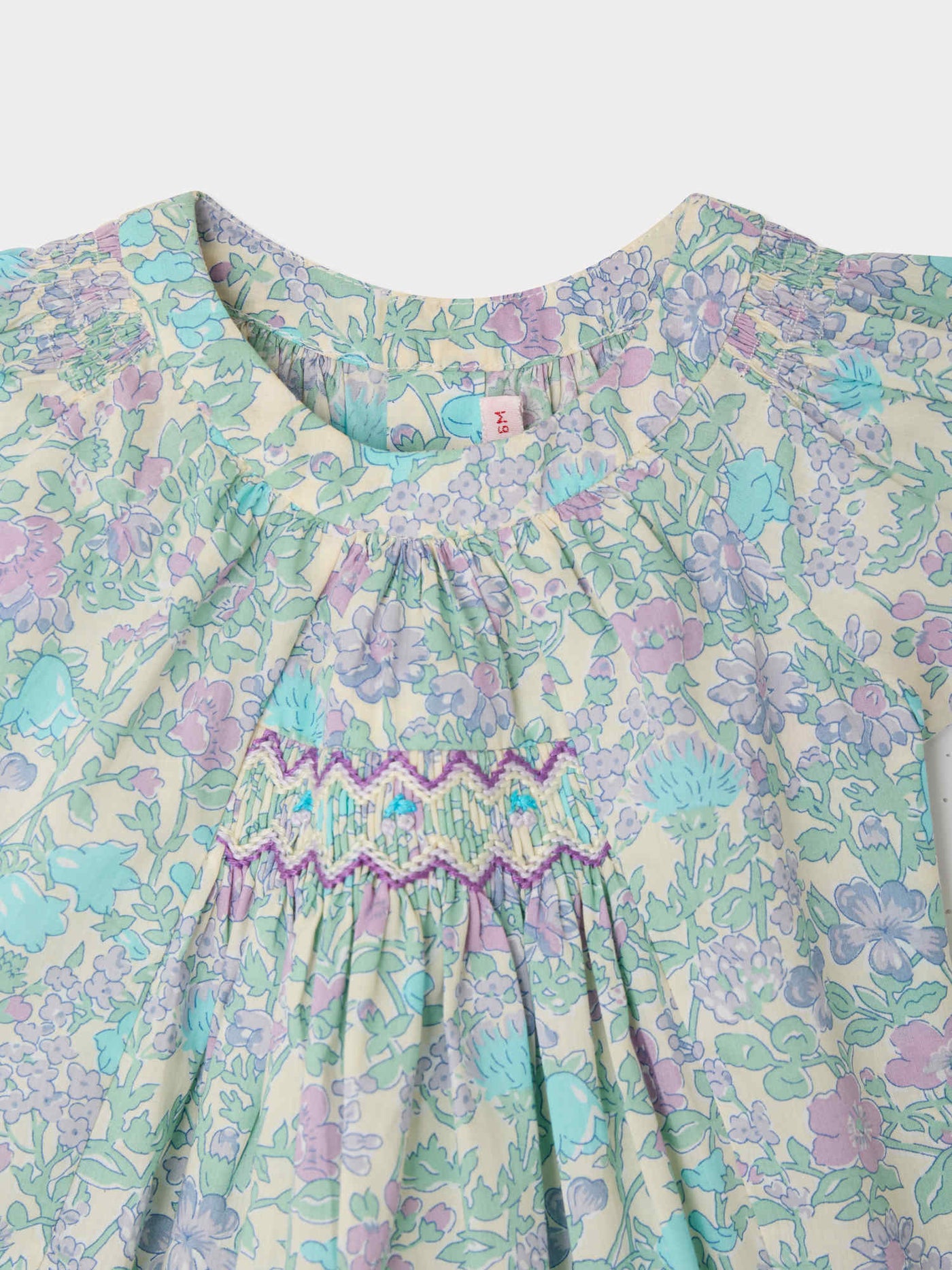 Laurie blouse smocked and hand-embroidered in Liberty organic cotton fabric