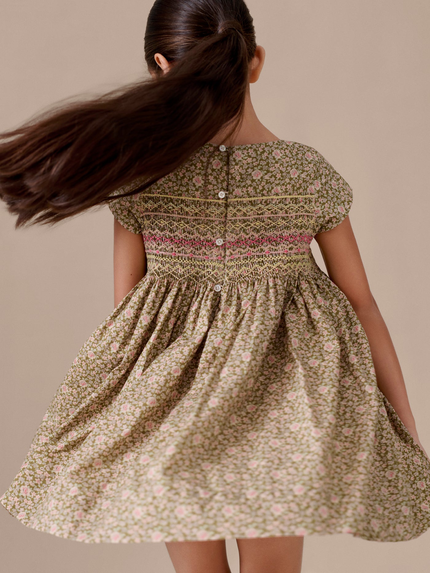 Duchesse dress smocked and hand-embroidered in Liberty organic cotton fabric