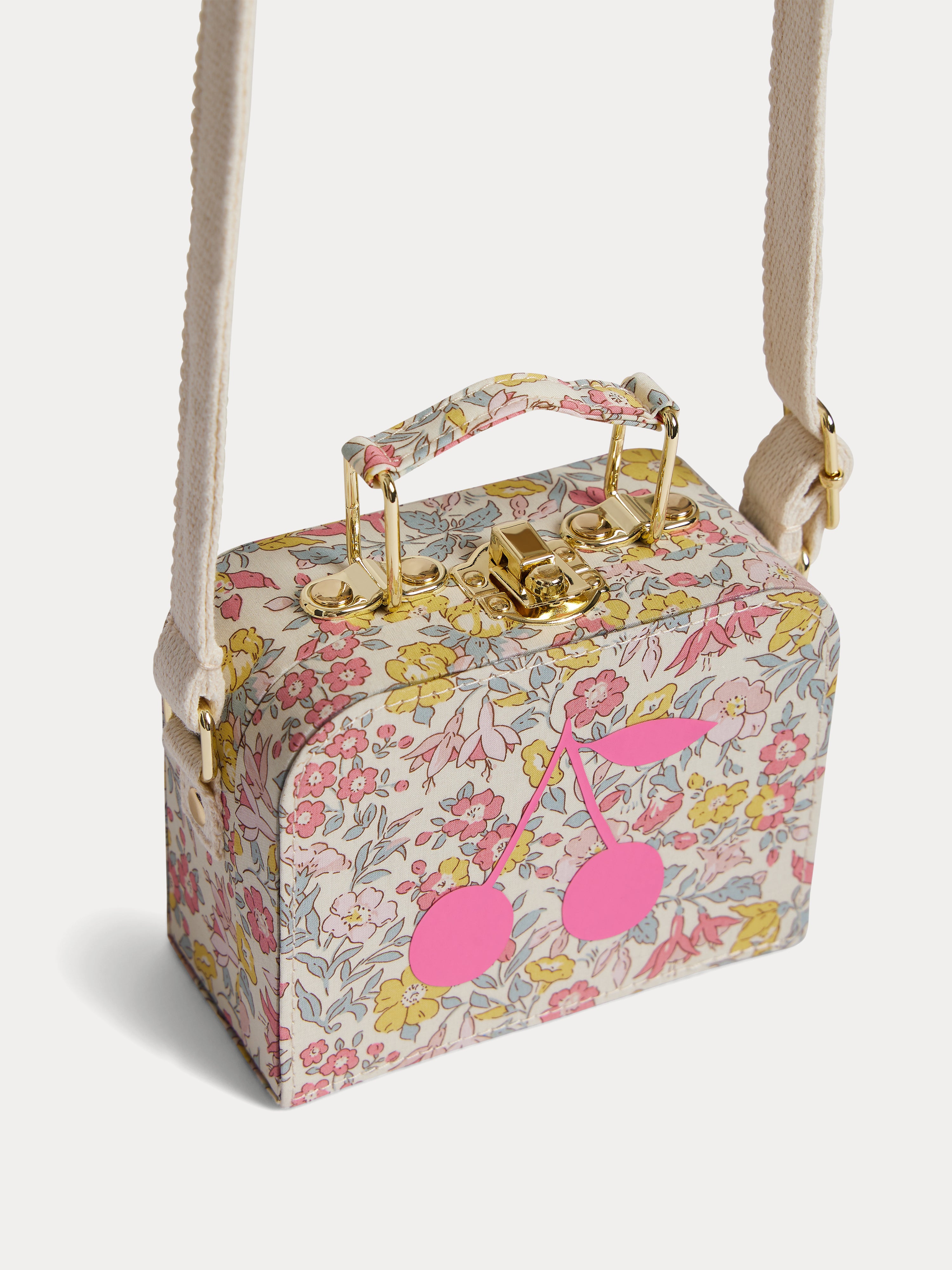 Aimane mini suitcase shoulder bag with a pink floral print