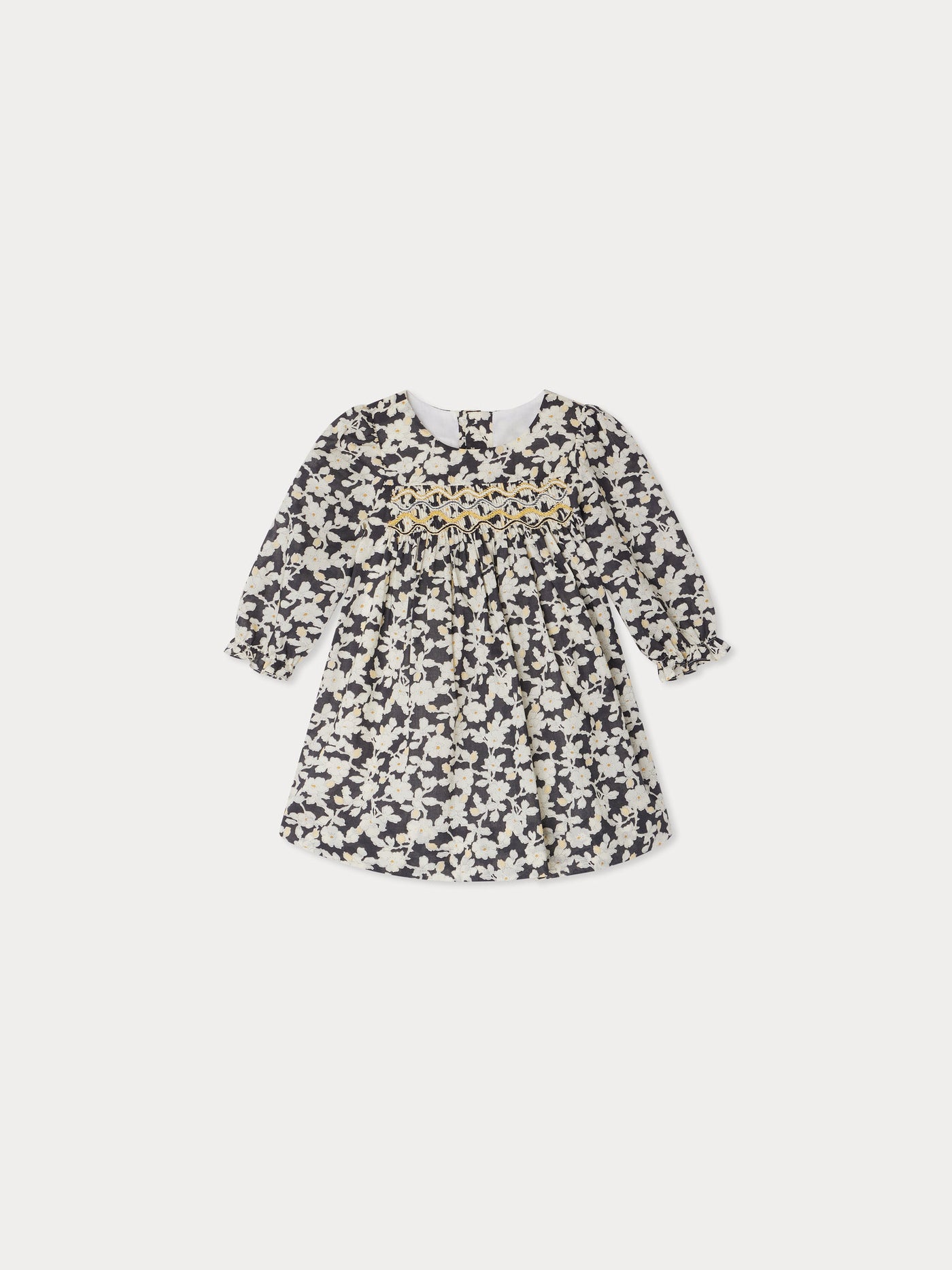Jailys smocked and embroidered dress in Liberty fabric in organic cotton
