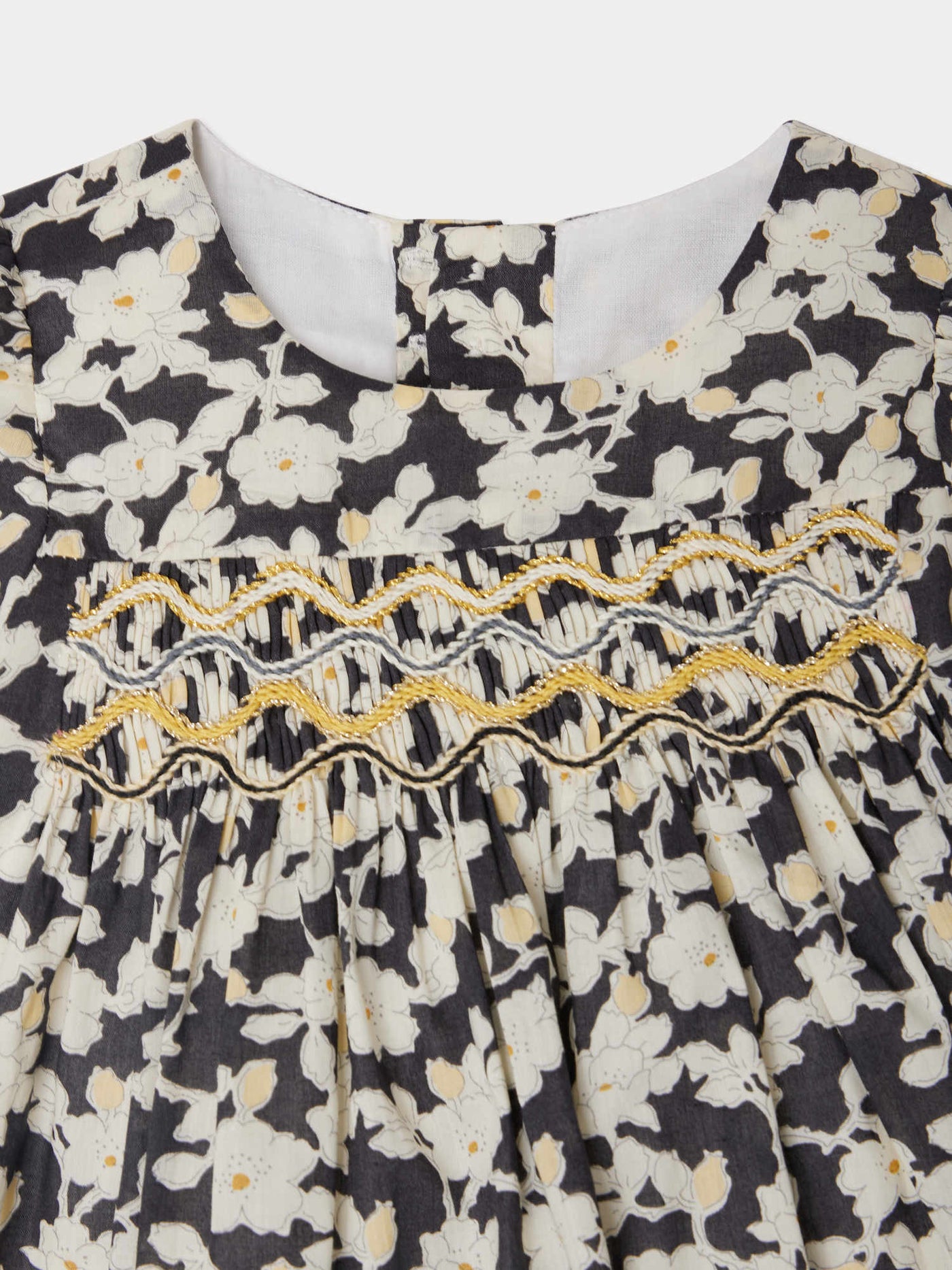 Jailys smocked and embroidered dress in Liberty fabric in organic cotton