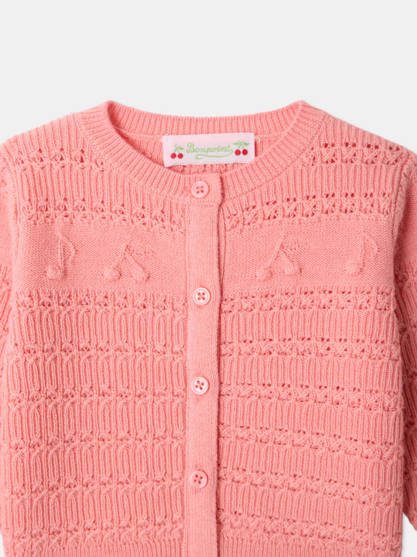 Mahana baby cardigan with cherry and musical note patterns