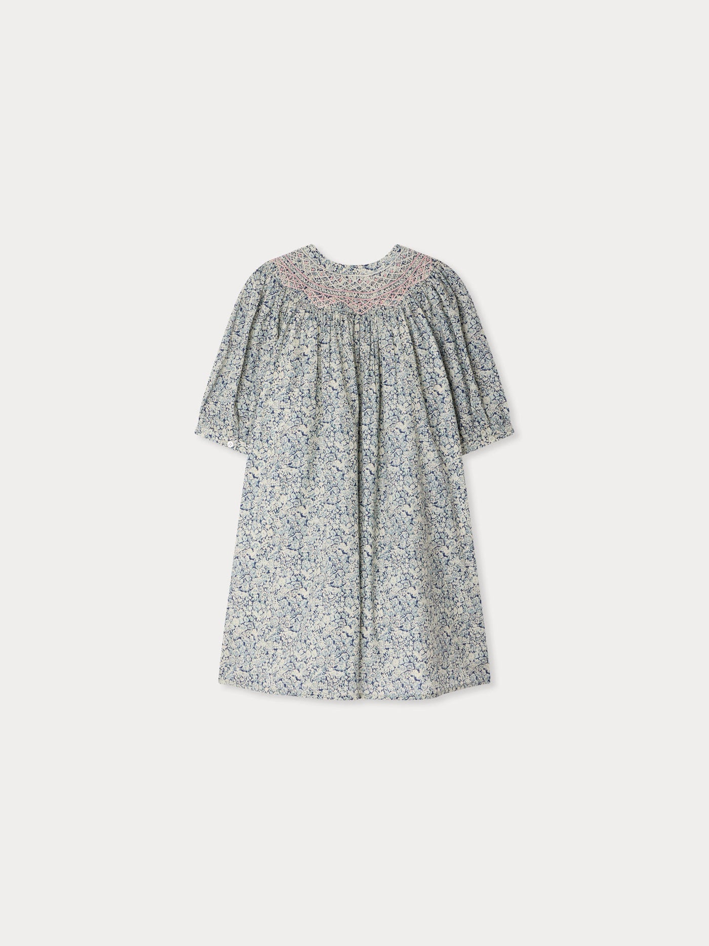 Ladwiga smocked and hand-embroidered dress in Liberty organic cotton fabric