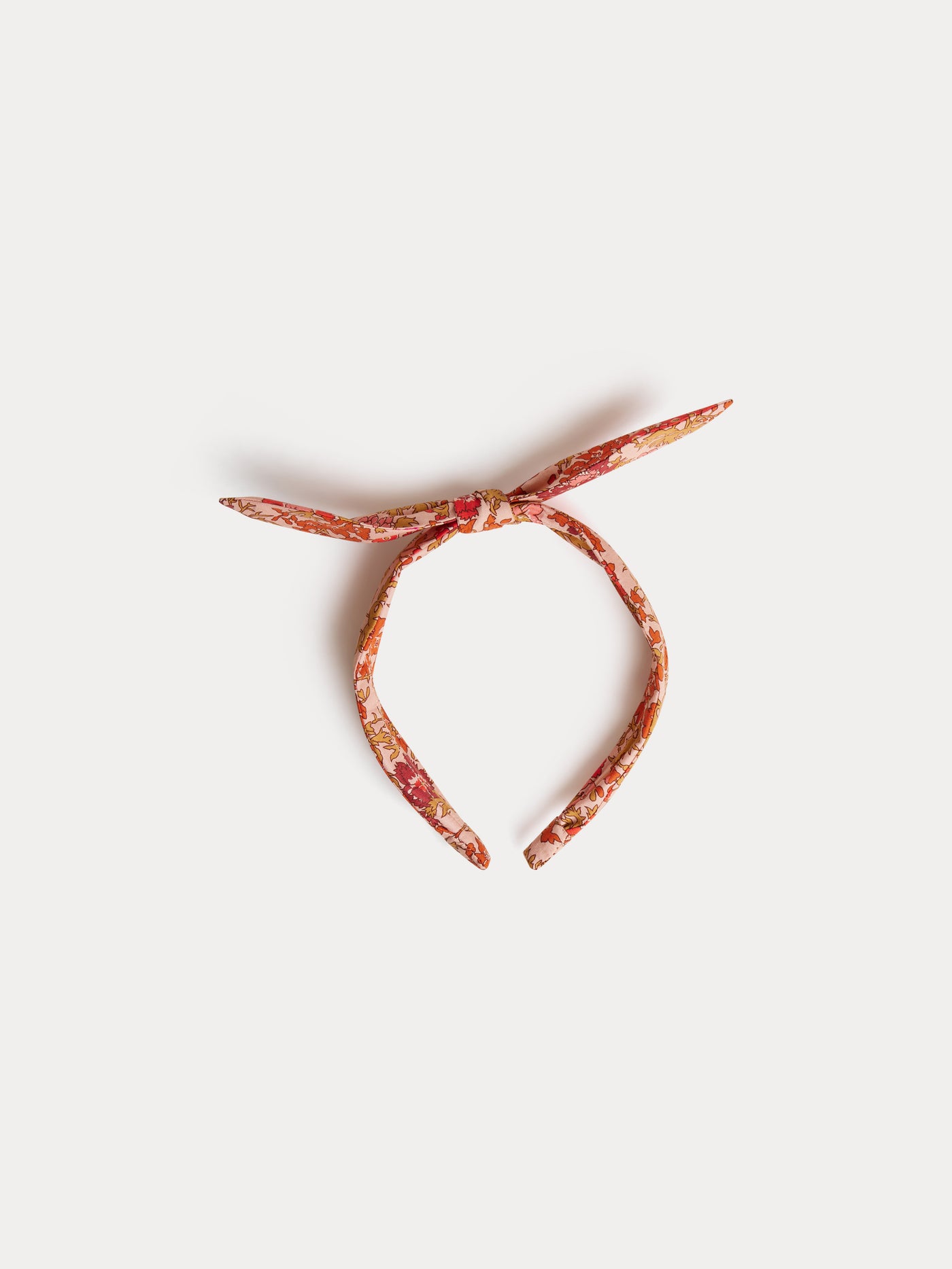 Lorette pink headband in Liberty organic cotton poplin fabric