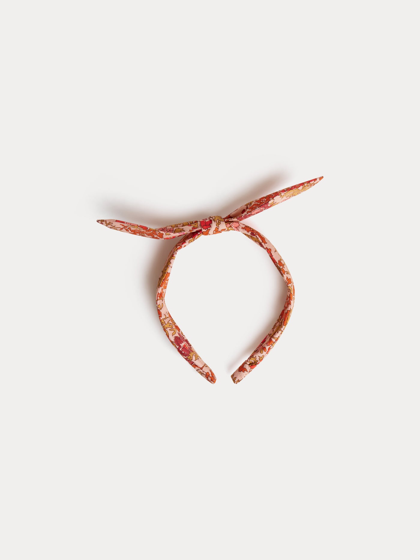 Lorette pink headband in Liberty organic cotton poplin fabric