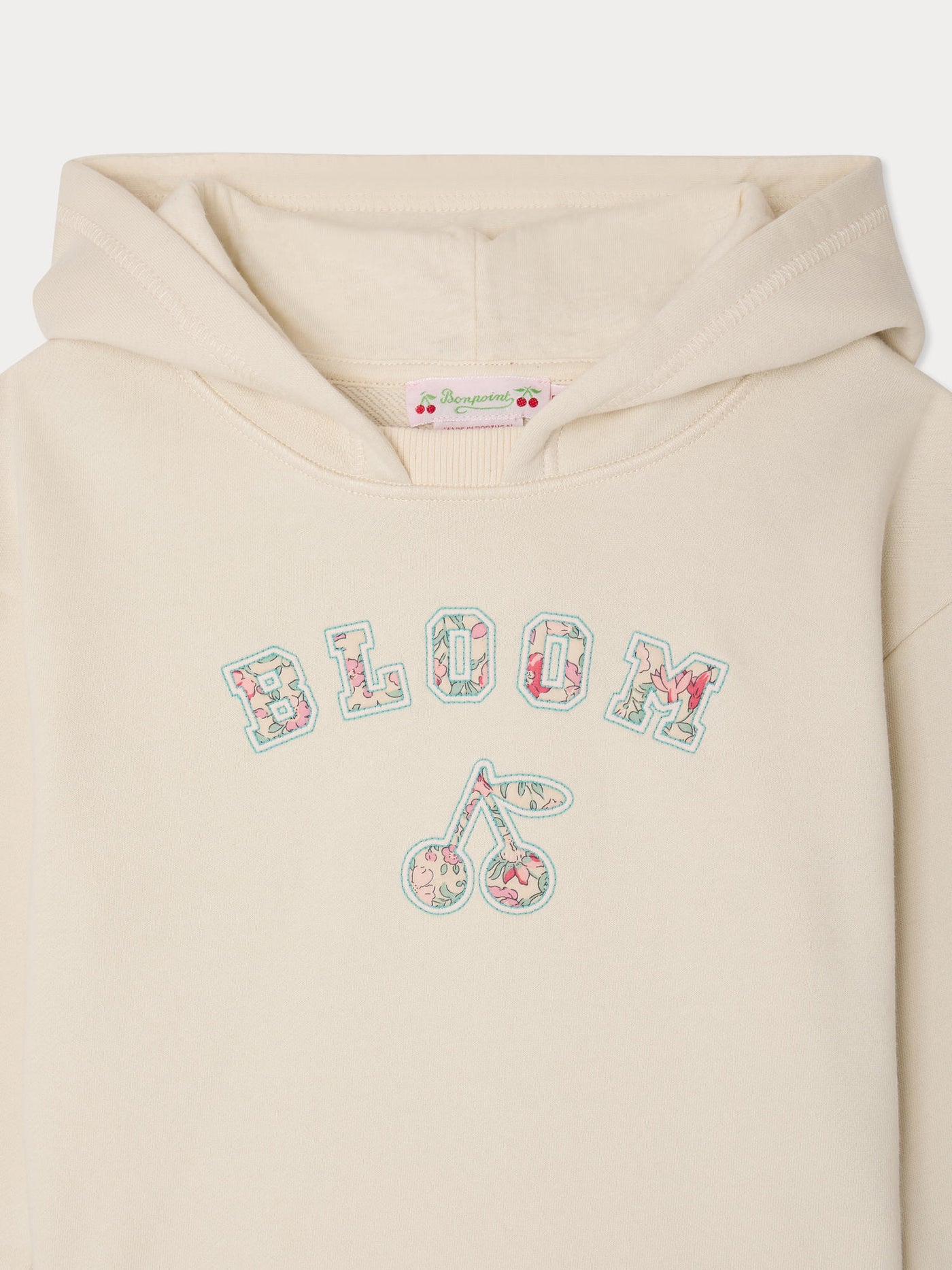 Carmine sweatshirt appliqué in Liberty fabric in organic cotton