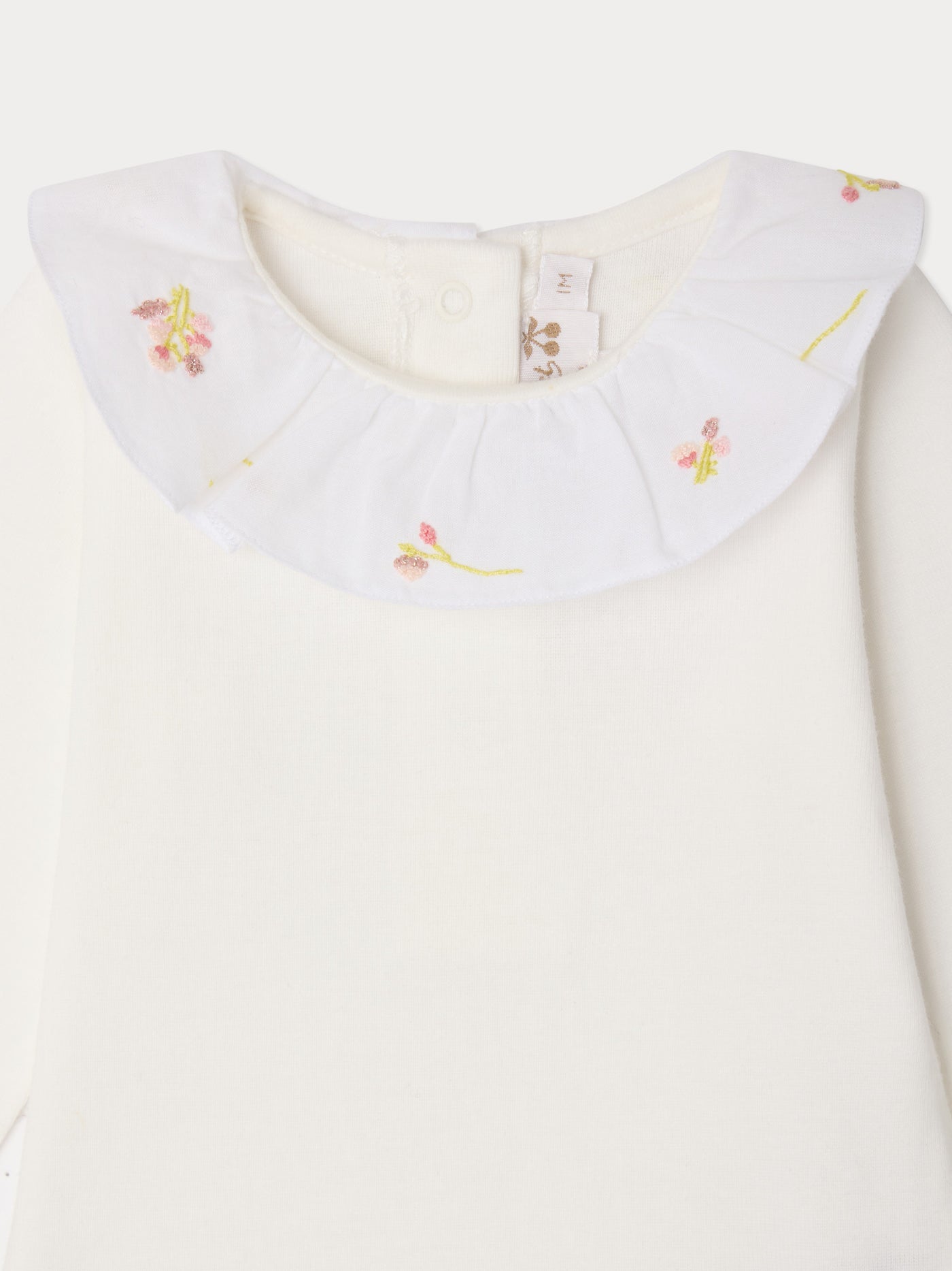 June bodysuit with hand-embroidered flowers in organic cotton
