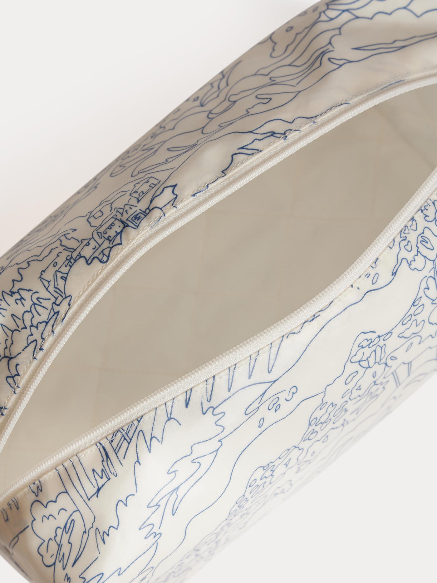 Blue quilted pouch in Liberty organic cotton fabric