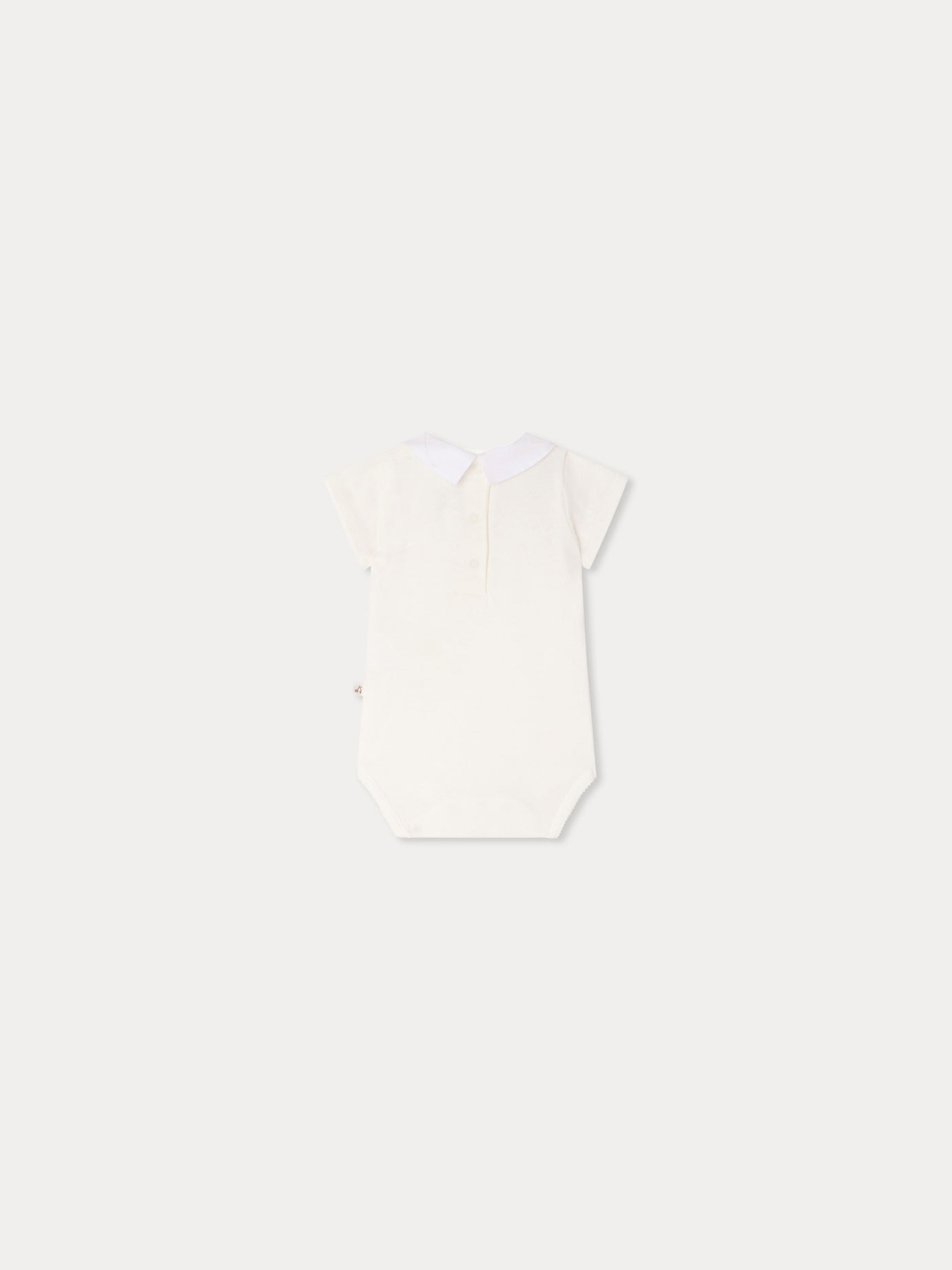 Juillet bodysuit with hand-embroidered kites in organic cotton