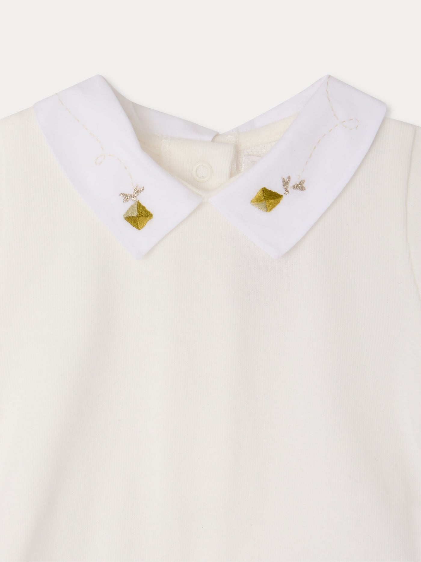 Juillet bodysuit with hand-embroidered kites in organic cotton