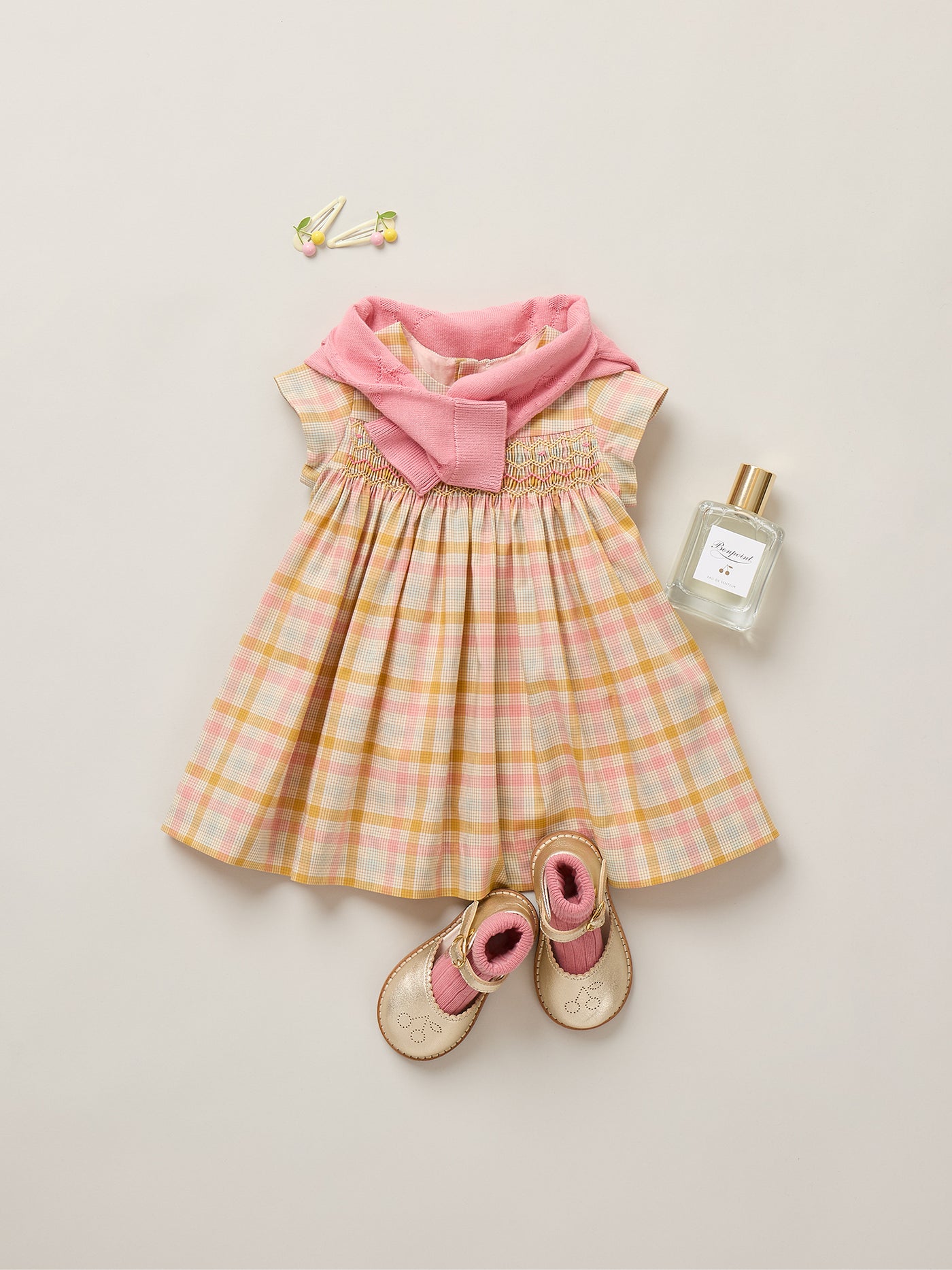 Marushka smocked and hand-embroidered dress in organic cotton