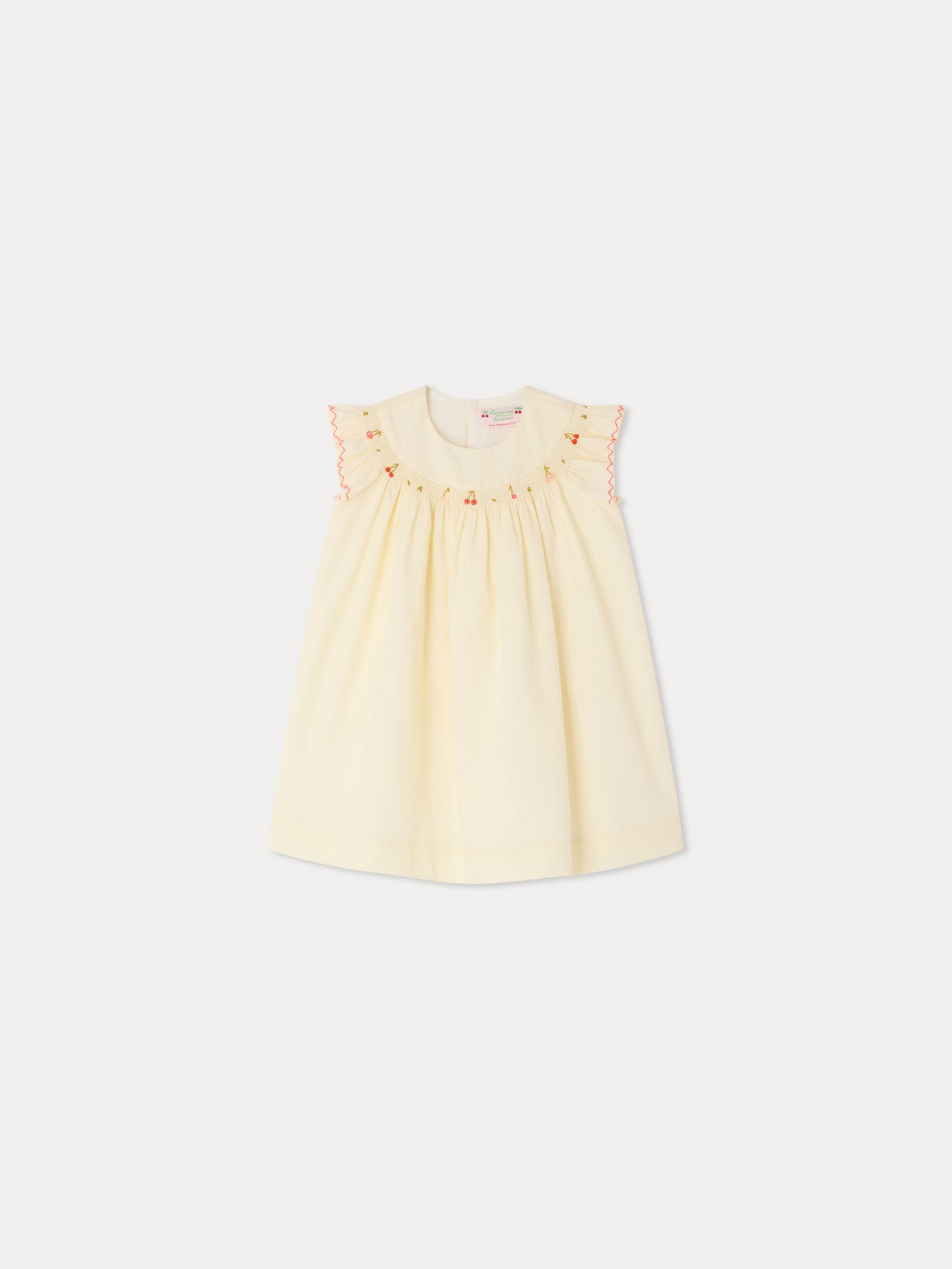 Amantine smocked and hand-embroidered dress in organic cotton