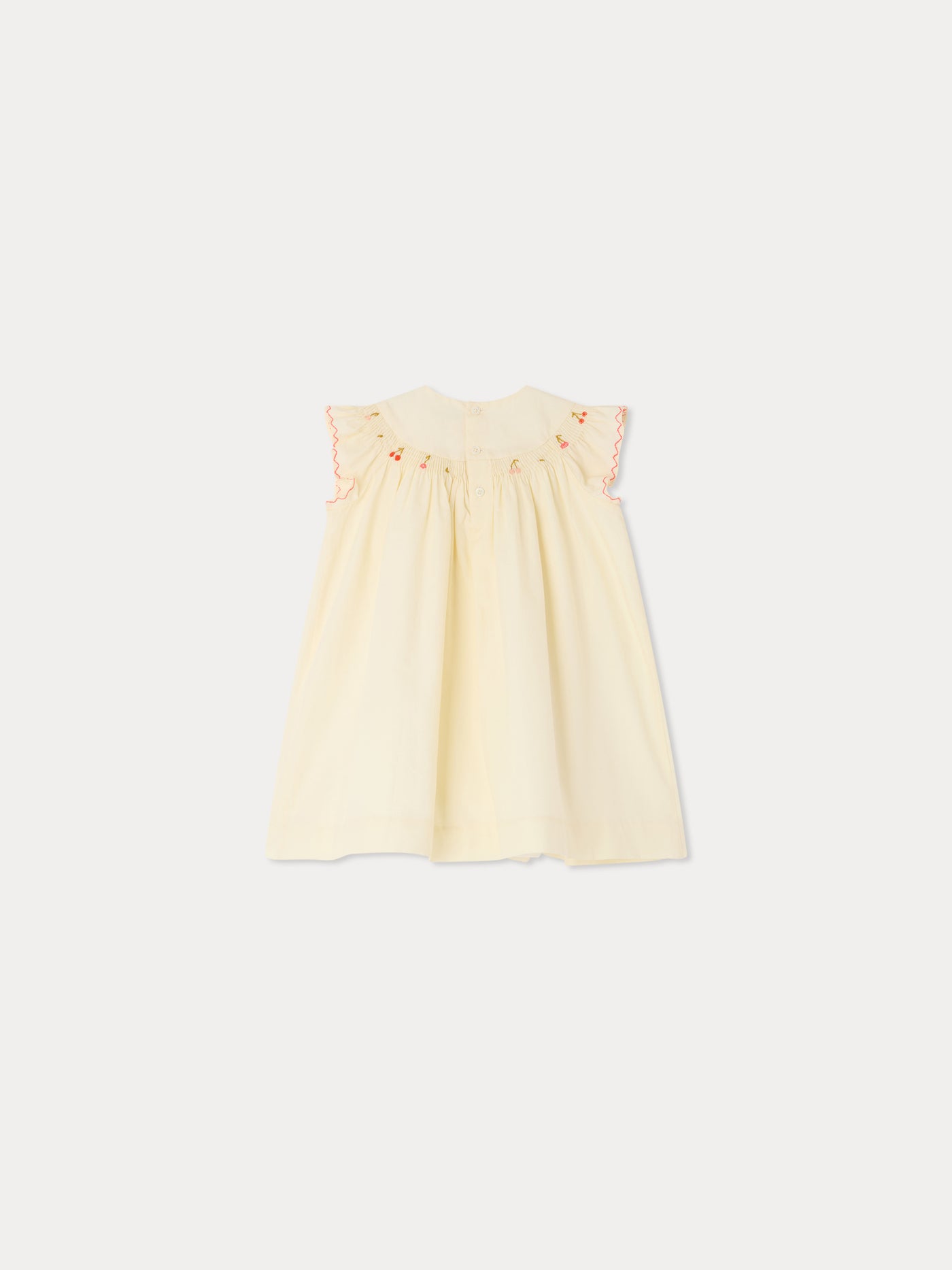 Amantine smocked and hand-embroidered dress in organic cotton