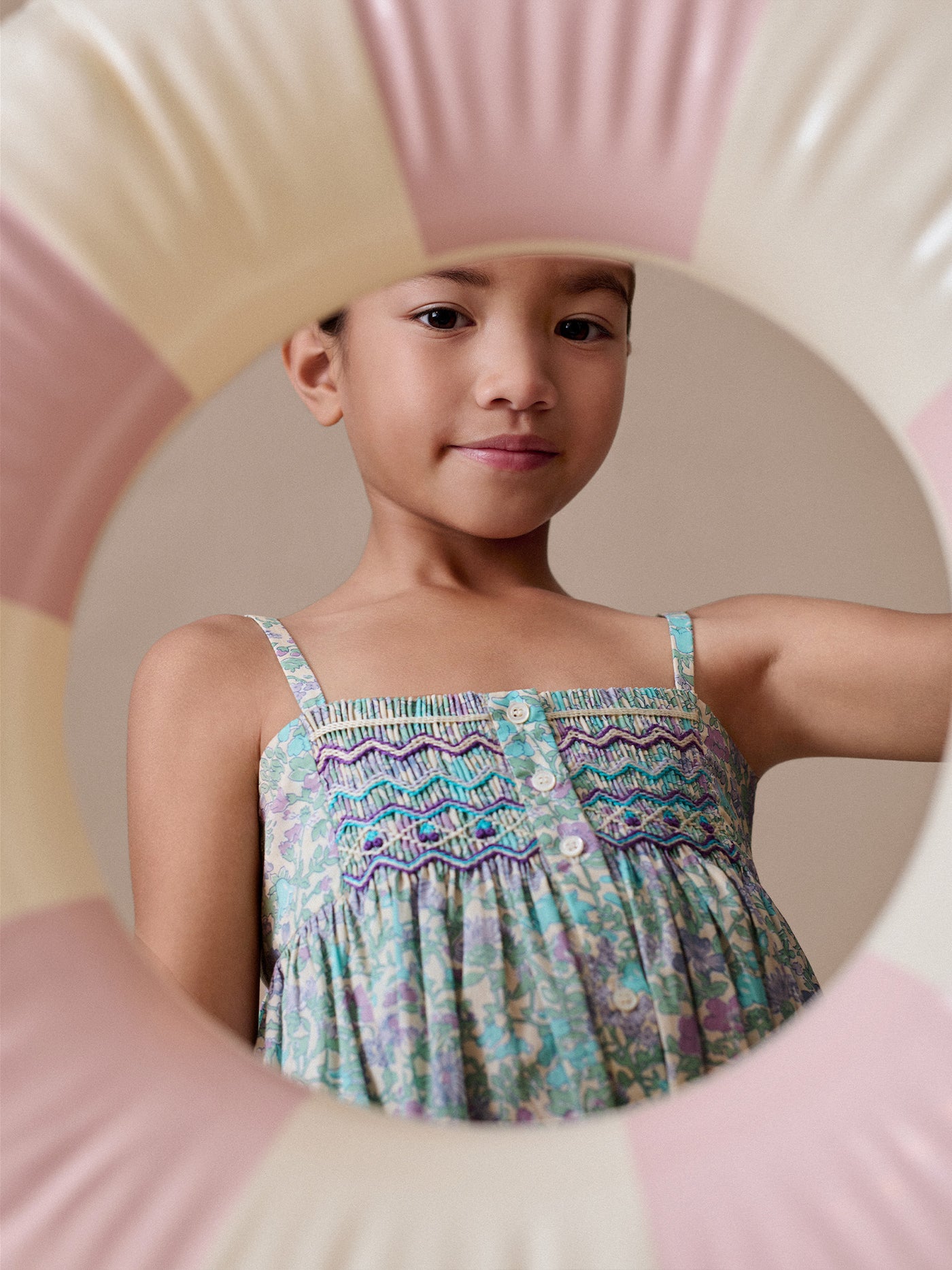 Passion dress smocked and embroidered in Liberty fabric in organic cotton