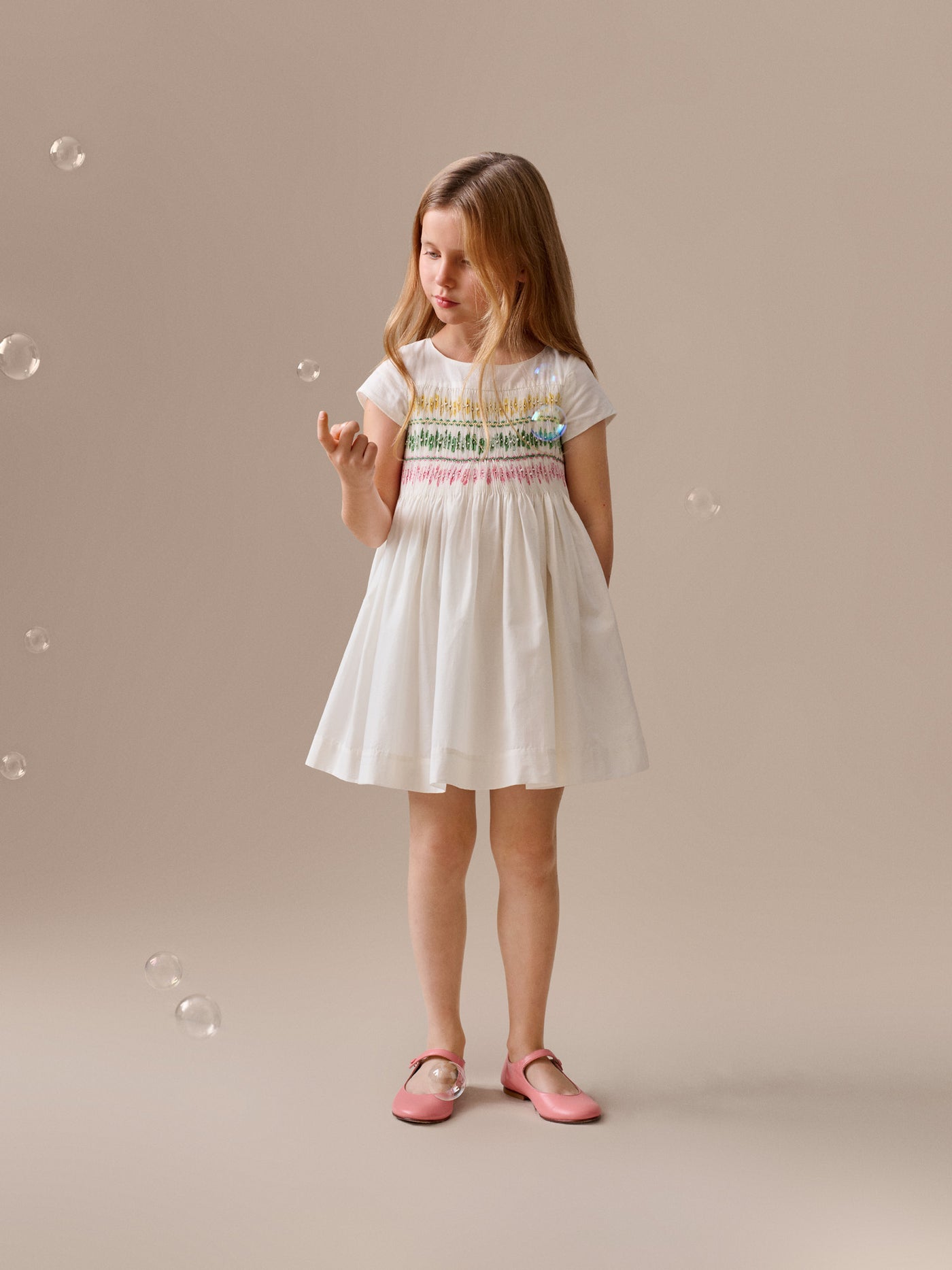 Tie-dye smocked and hand-embroidered Duchesse dress in organic cotton