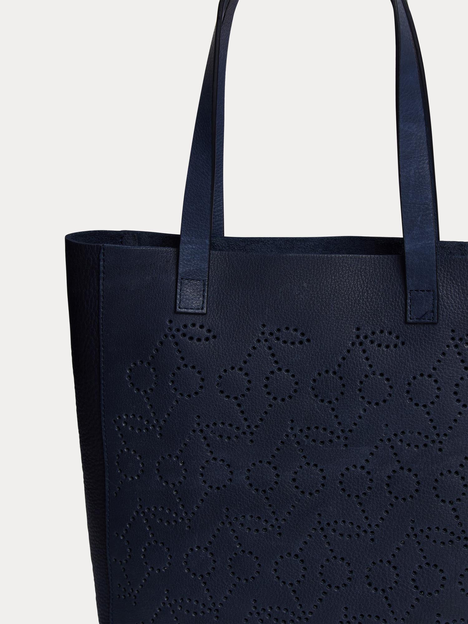 Perforated handbag on sale