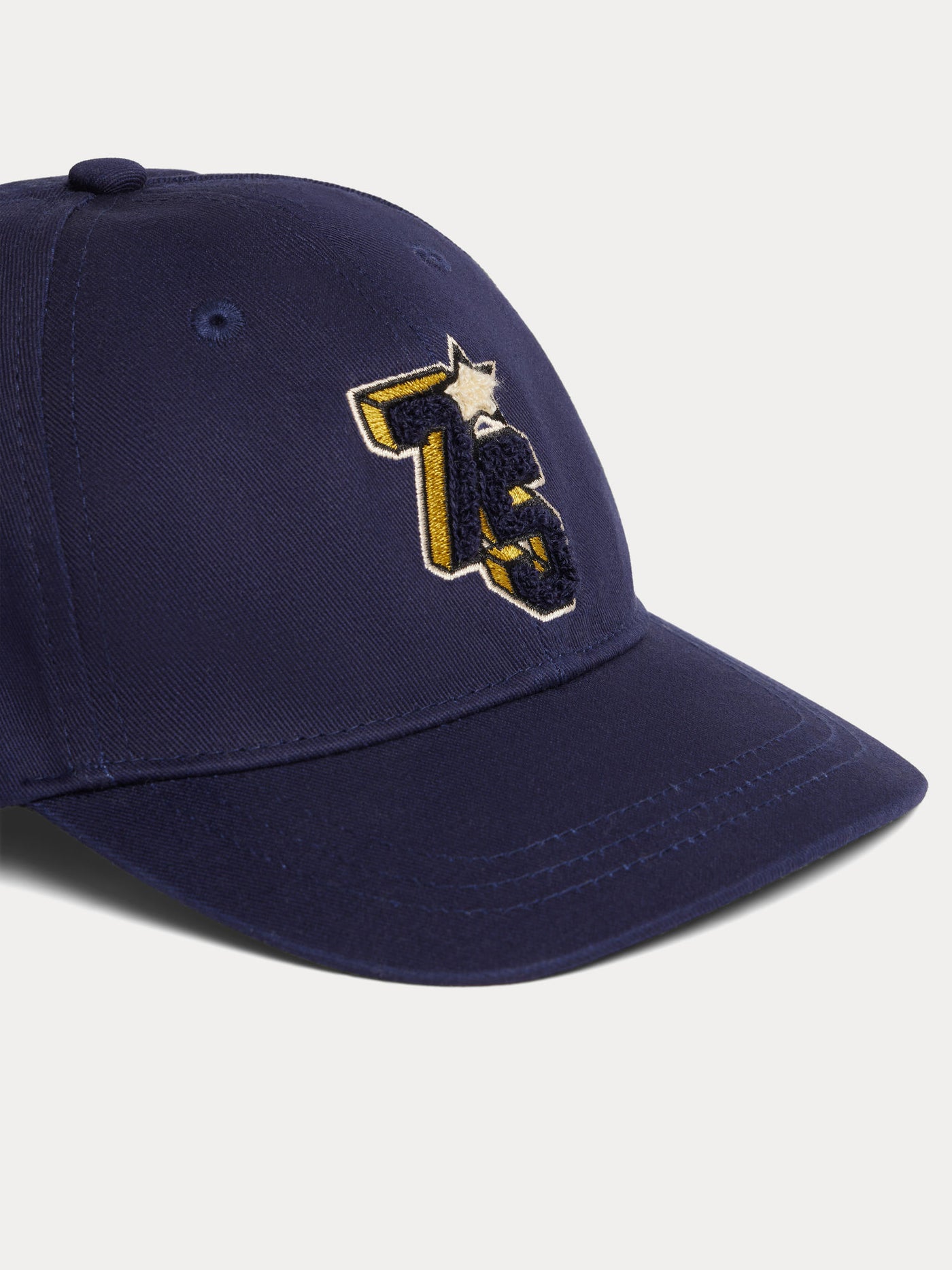 Arnold cap with navy blue cotton patch