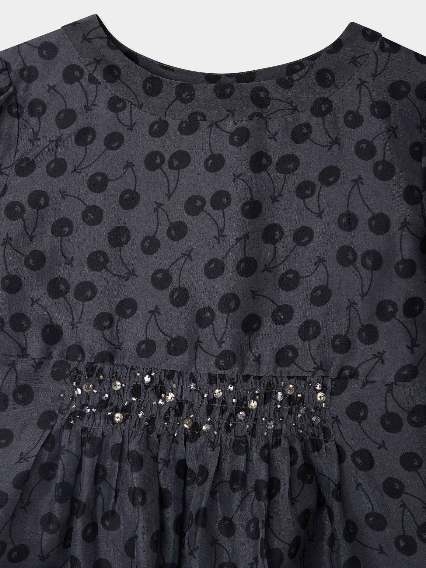 Junia smocked dress with cherry prints hand-embroidered with silk rhinestones