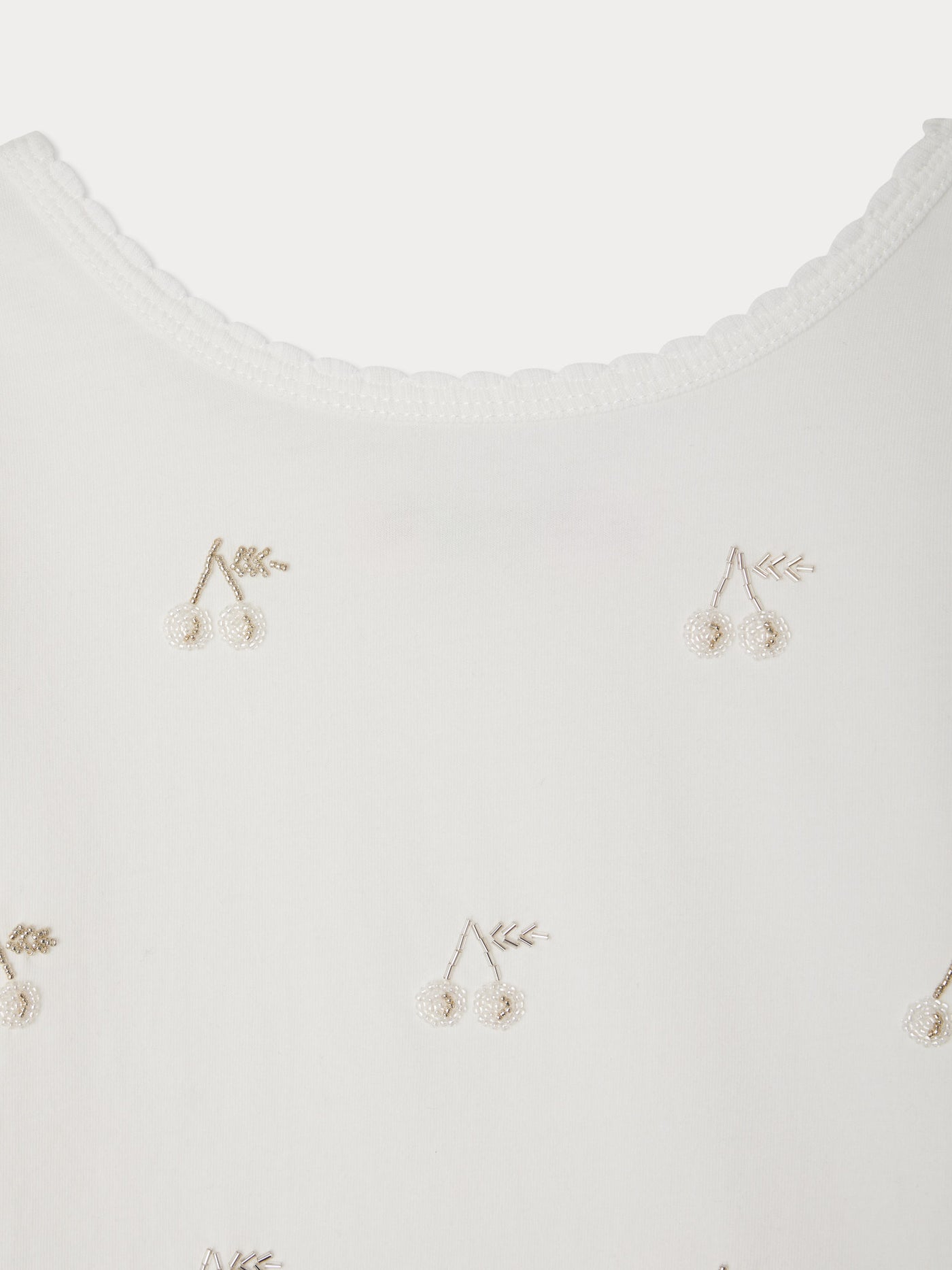 Jibou T-shirt embroidered with golden cherry beads in organic cotton