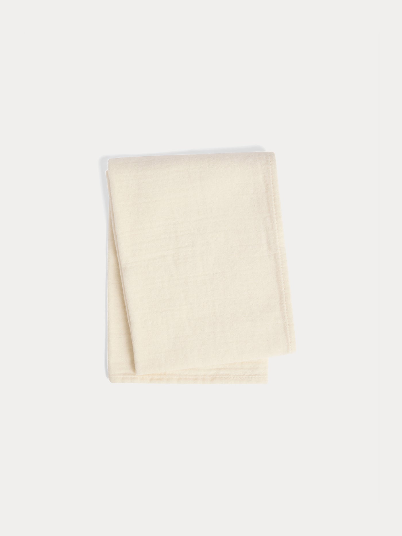 Set of plain and floral print cuddly swaddles in organic cotton