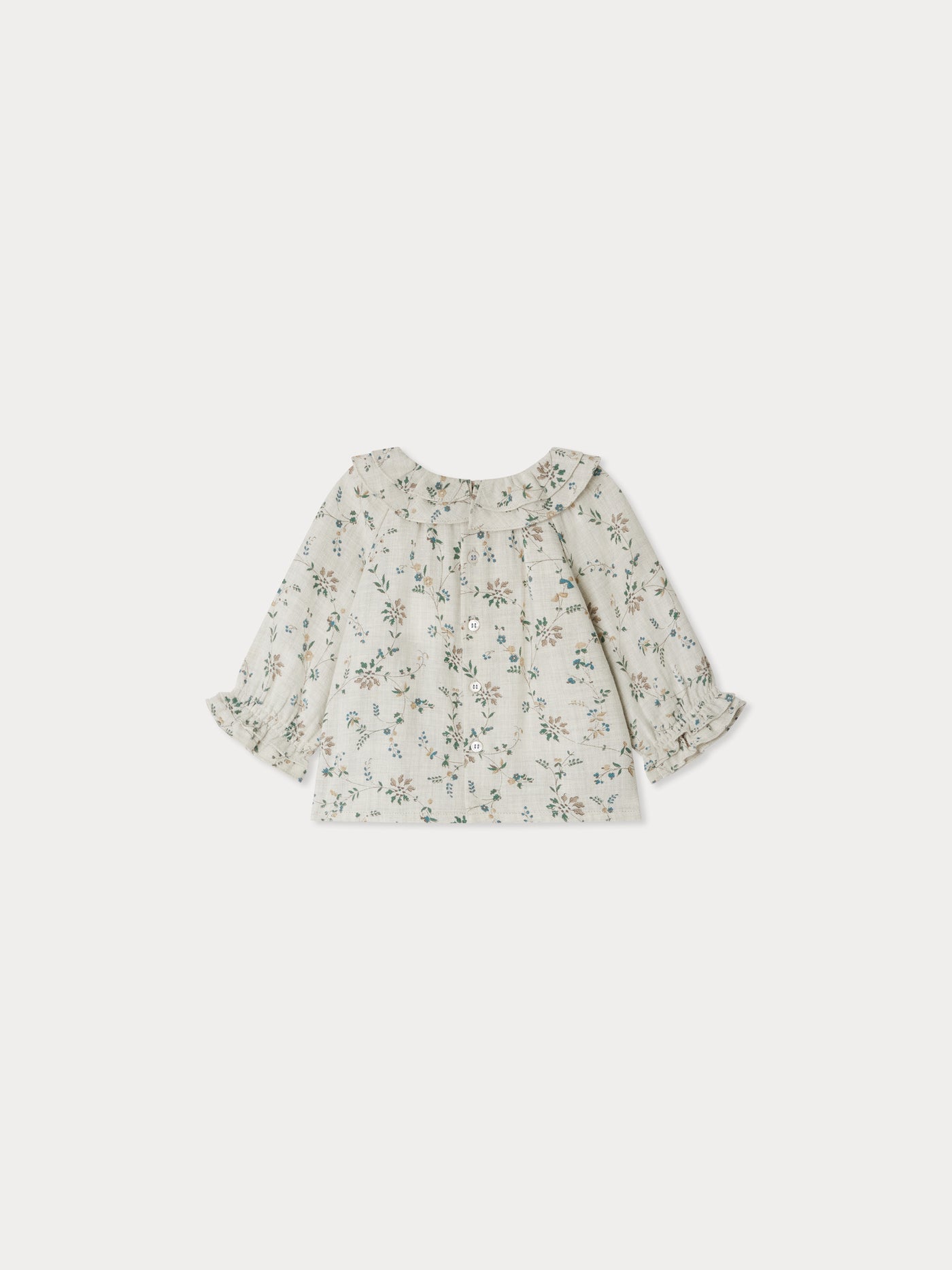 Dolci ruffled round neck blouse