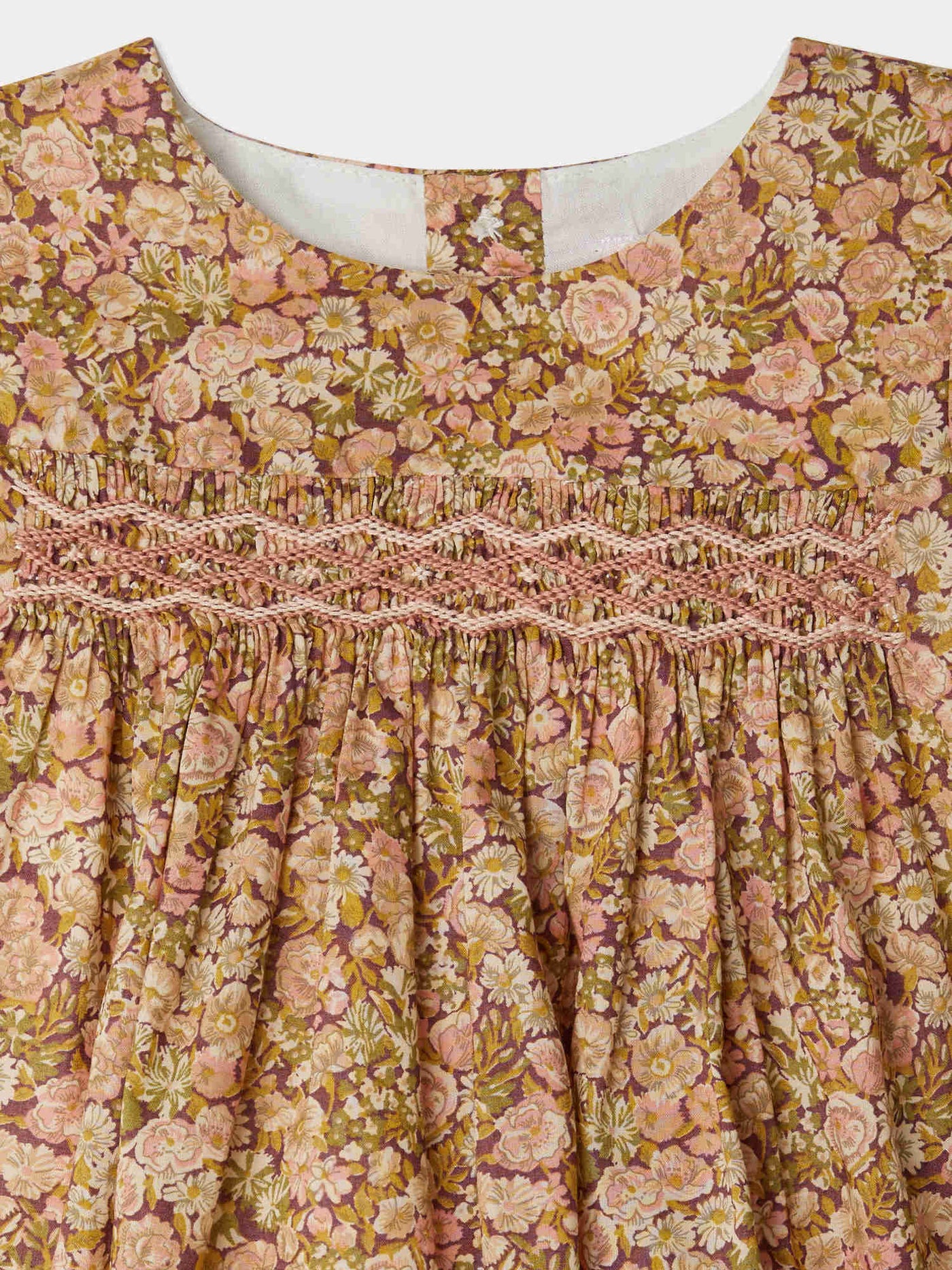 Félicie smocked and embroidered dress in Liberty fabric in organic cotton
