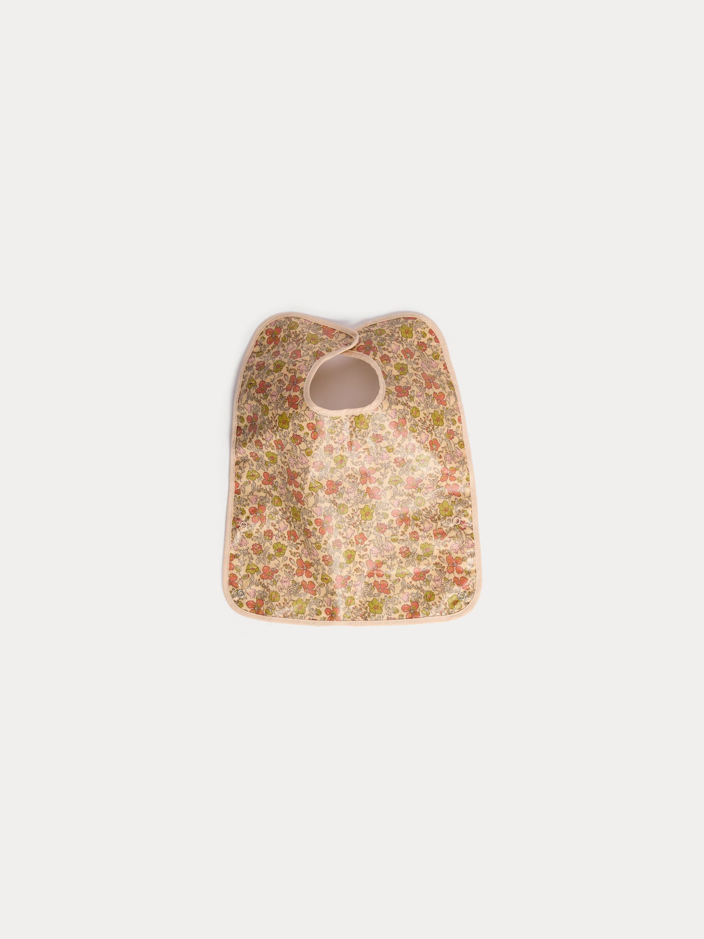 Clip-on bib in yellow Liberty fabric in coated organic cotton