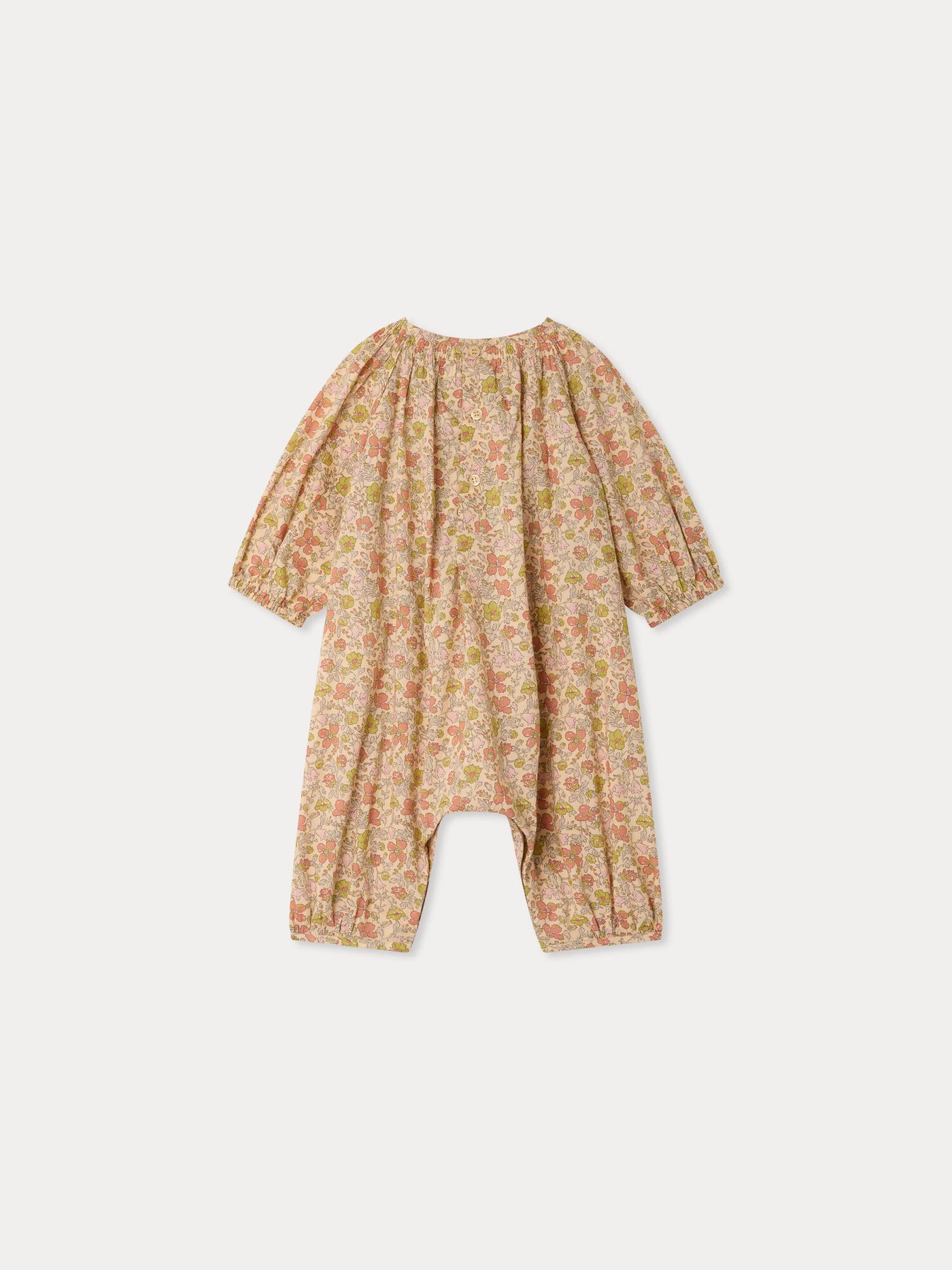 Jia playsuit in smocked and hand-embroidered Liberty organic cotton fabric