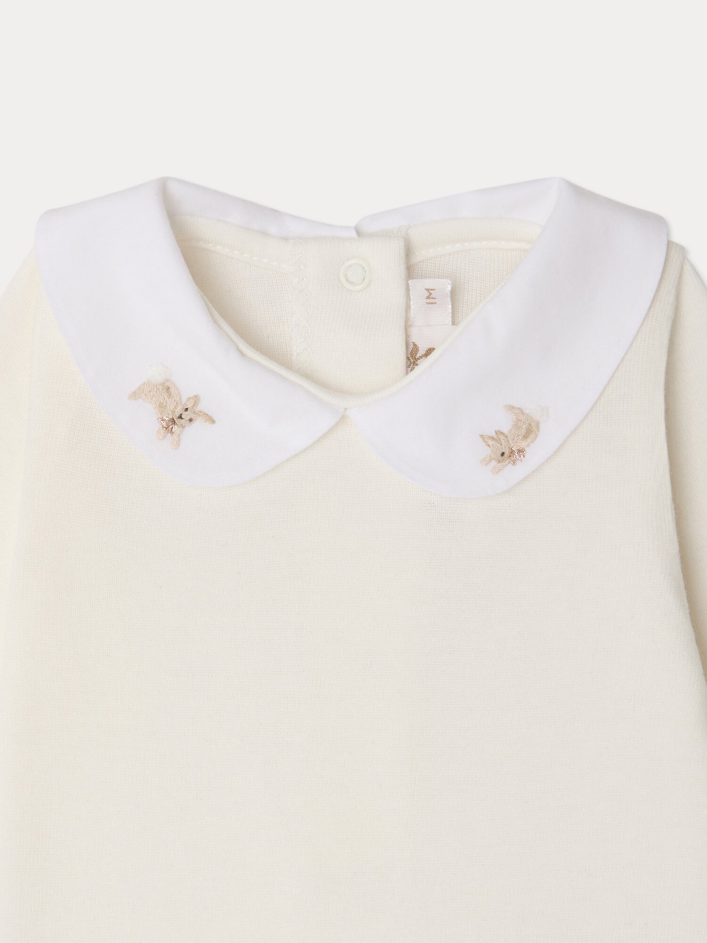 Cygne bodysuit with hand-embroidered rabbit collar in organic cotton