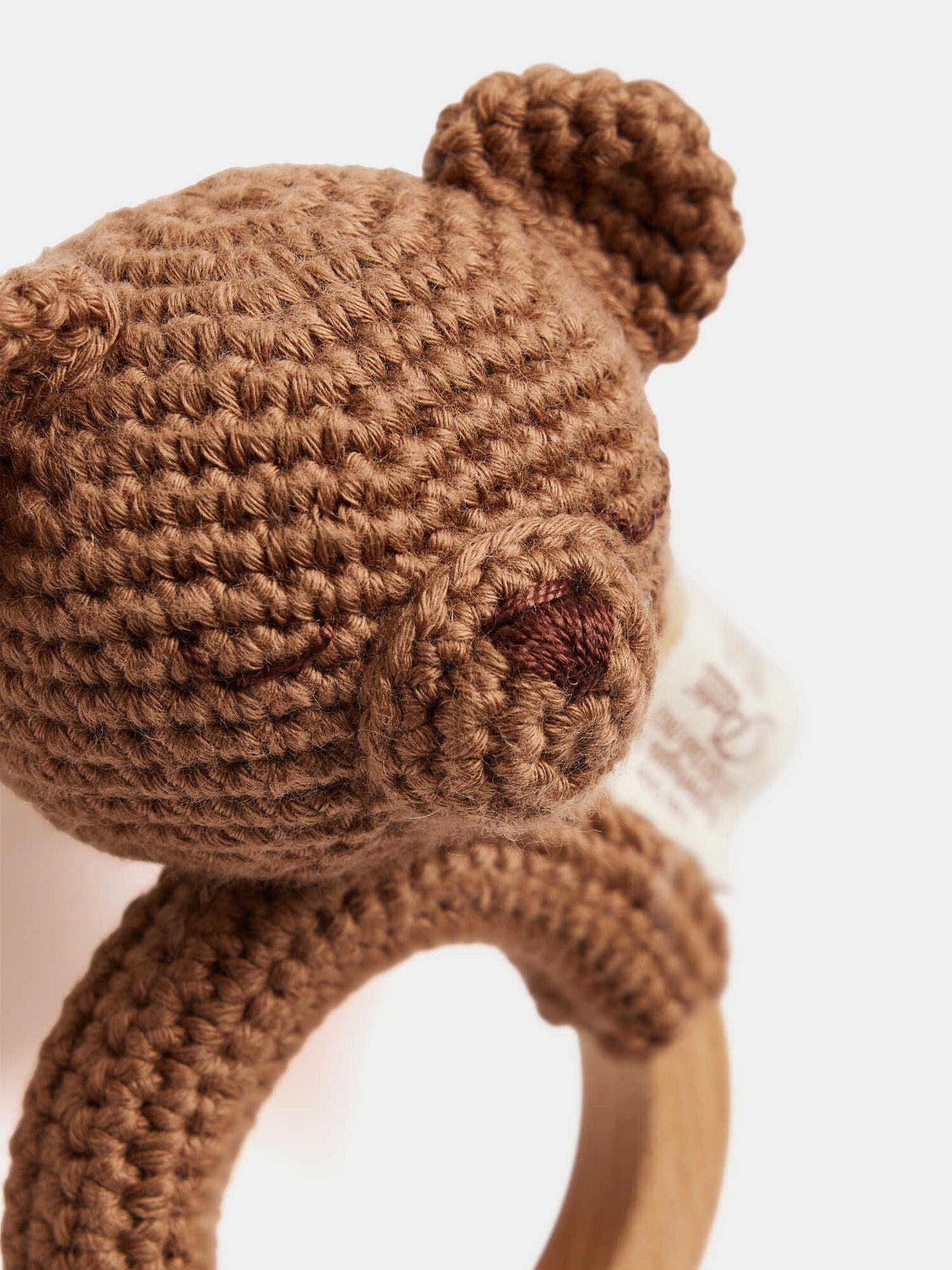 Micka brown bear hand-crocheted rattle in organic cotton