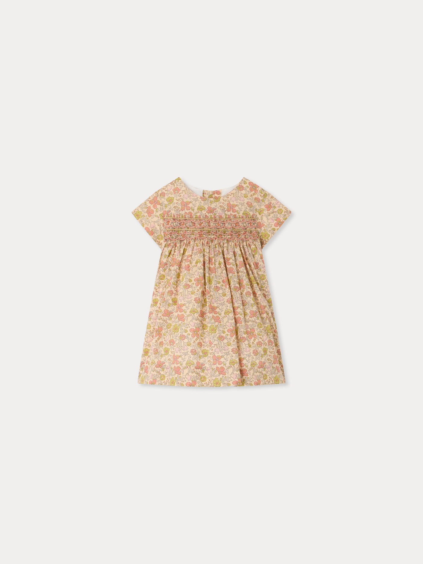 Maruska baby dress in Liberty fabric smocked and hand-embroidered in organic cotton