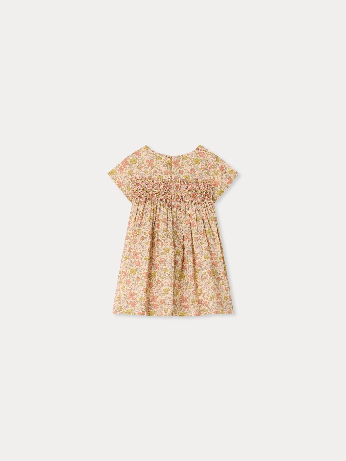 Maruska baby dress in Liberty fabric smocked and hand-embroidered in organic cotton