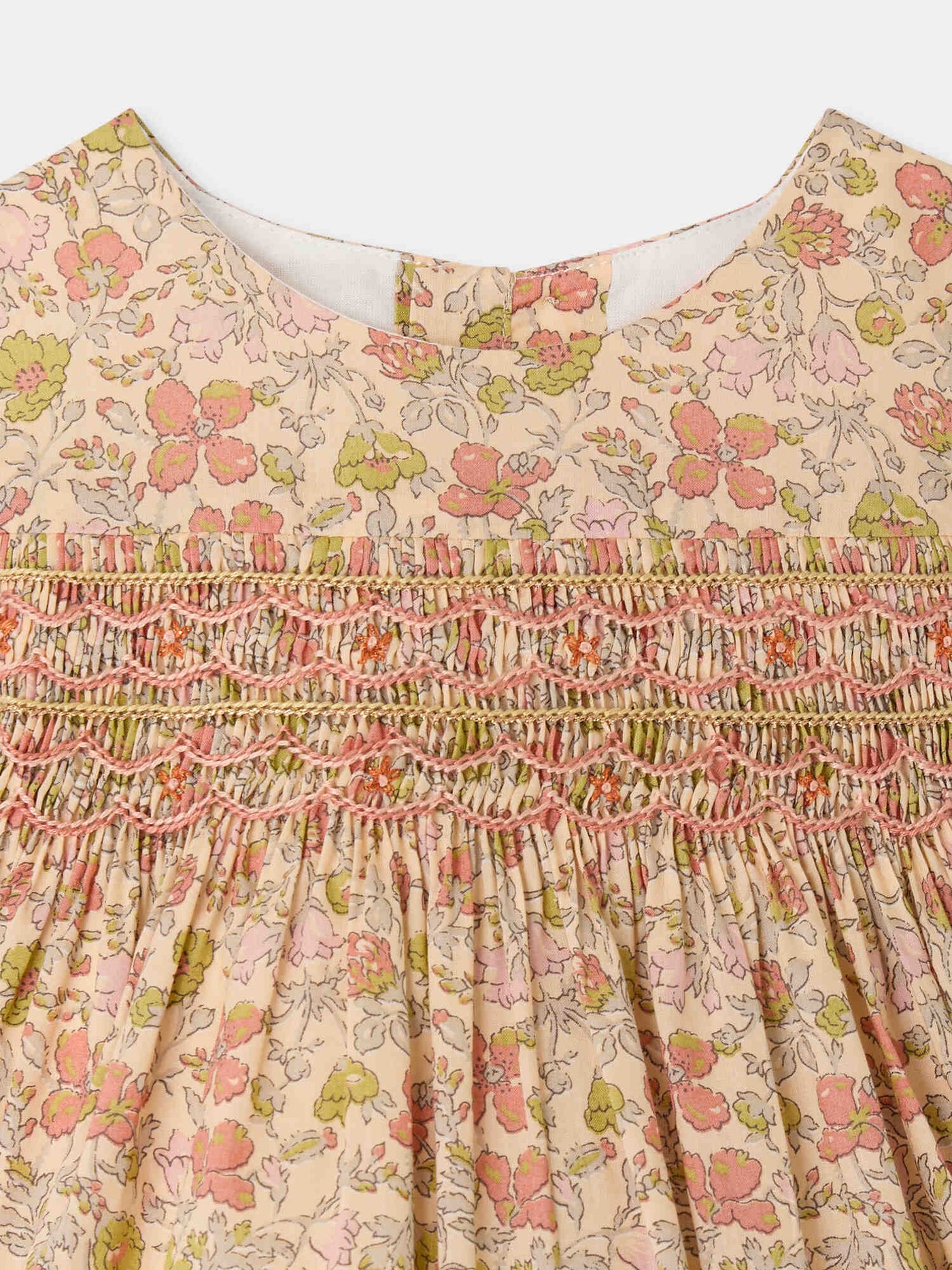 Maruska baby dress in Liberty fabric smocked and hand-embroidered in organic cotton