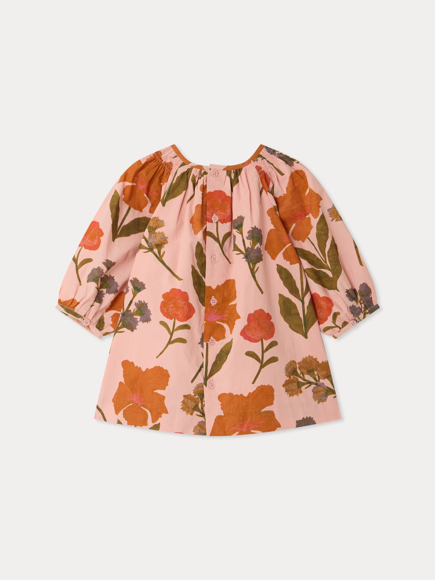 Muce baby smocked dress in organic cotton flower print